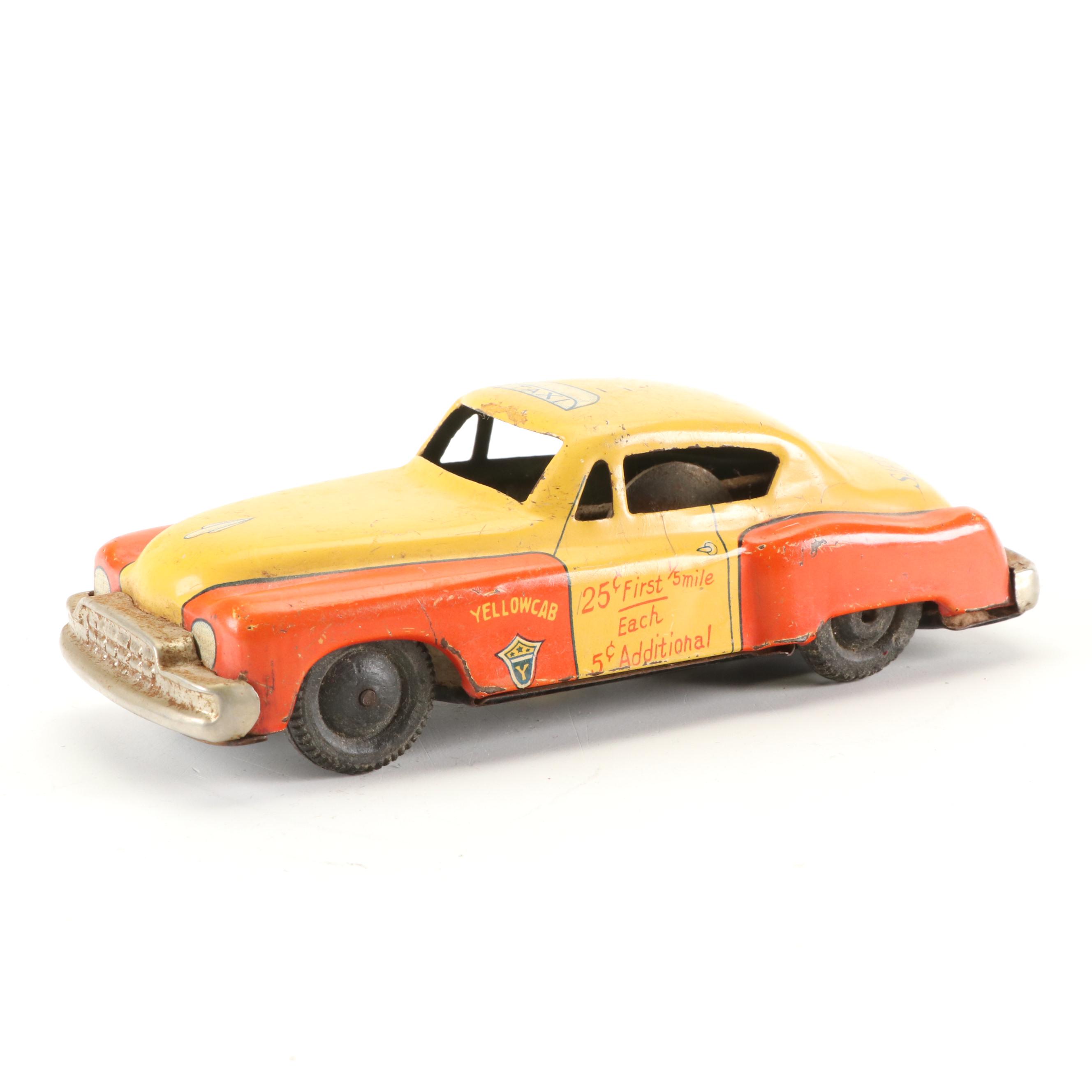 Mizuno Electromobile Tin Lithograph Battery Operated Taxi with Friction Cabs