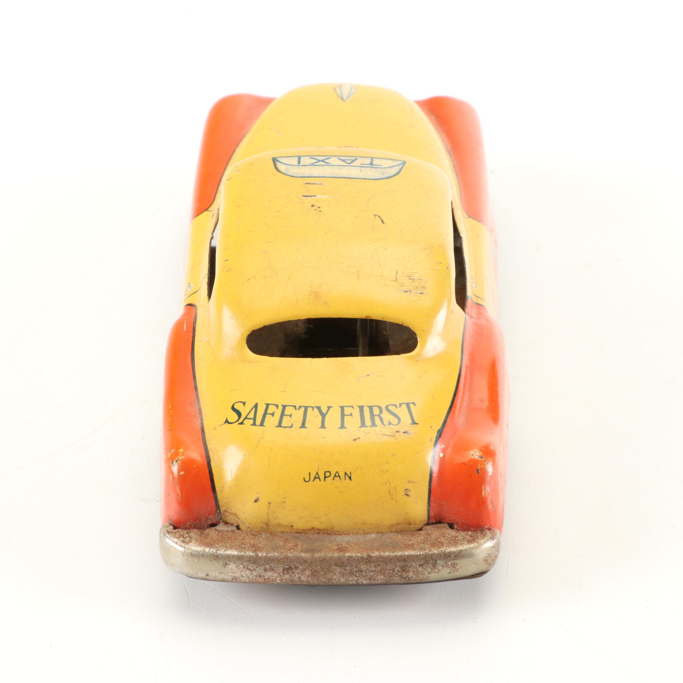 Mizuno Electromobile Tin Lithograph Battery Operated Taxi with Friction Cabs