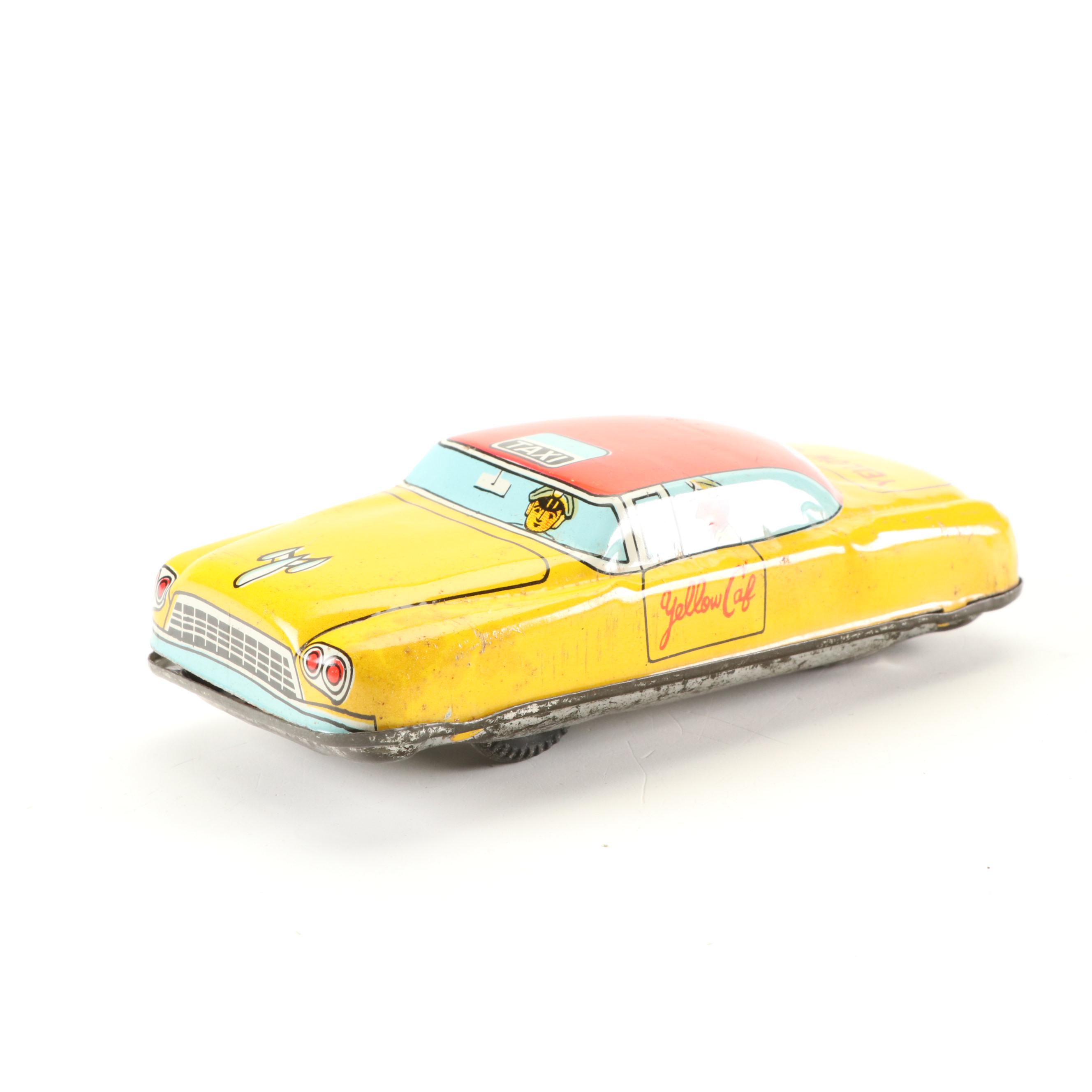 Mizuno Electromobile Tin Lithograph Battery Operated Taxi with Friction Cabs