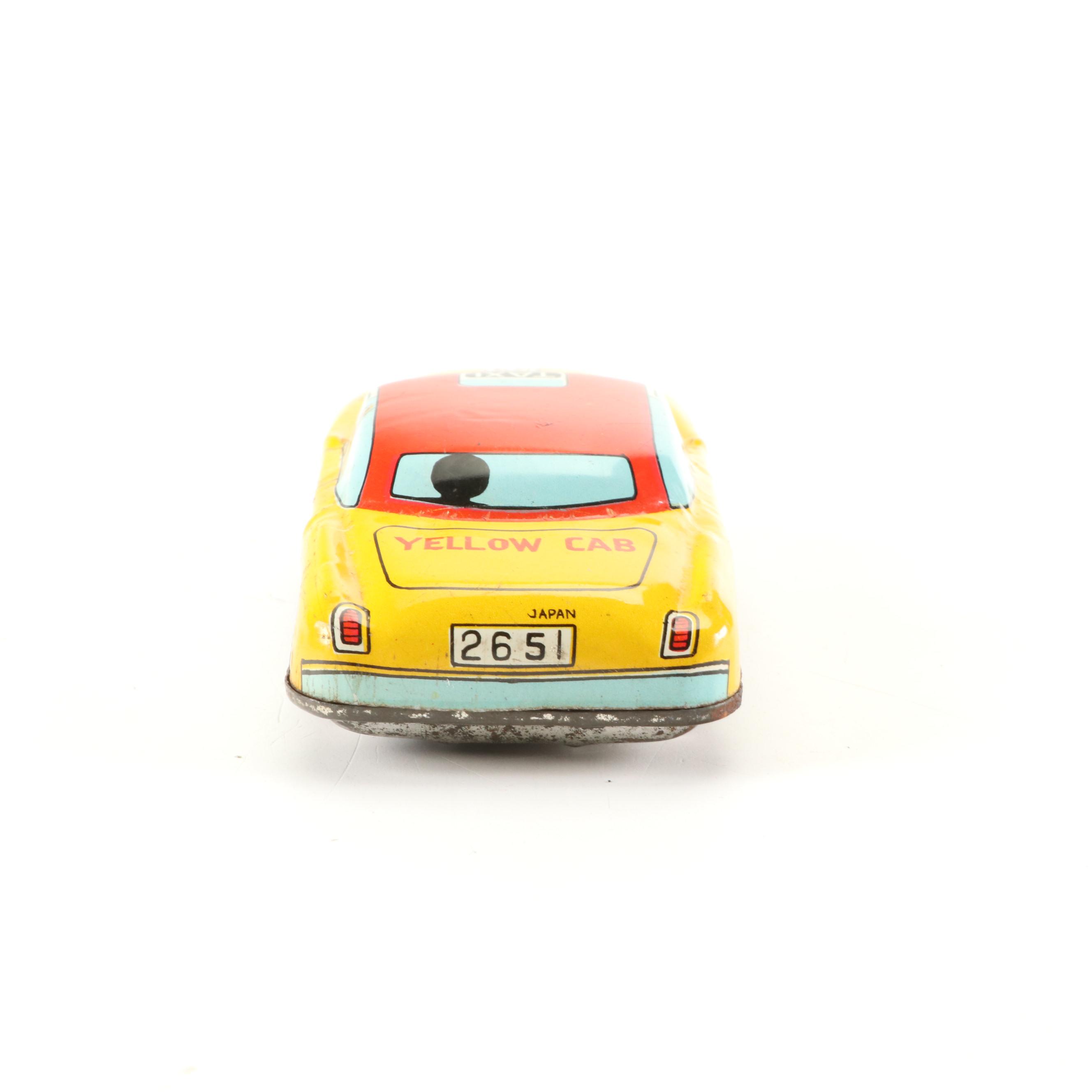 Mizuno Electromobile Tin Lithograph Battery Operated Taxi with Friction Cabs