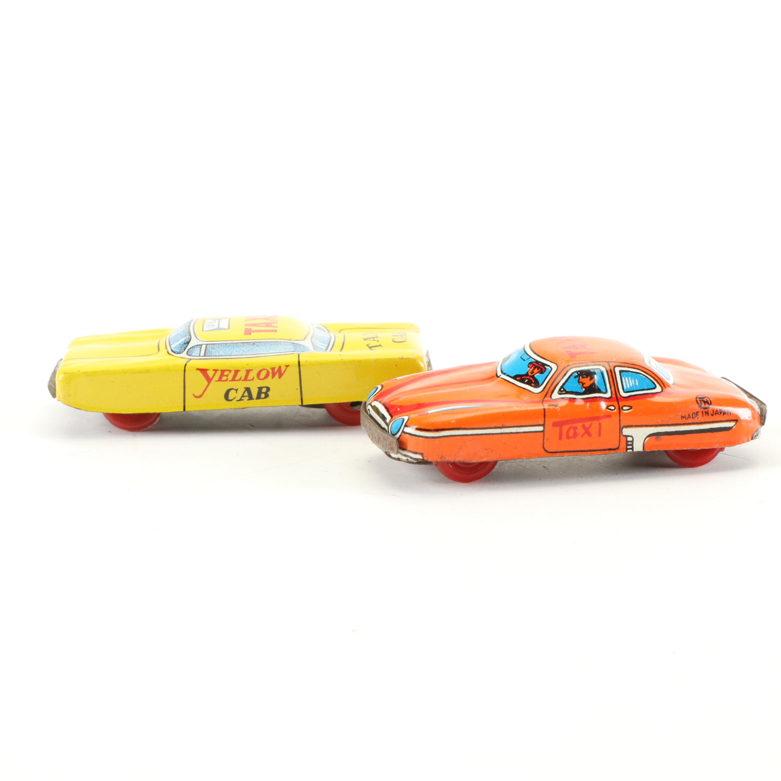 Mizuno Electromobile Tin Lithograph Battery Operated Taxi with Friction Cabs
