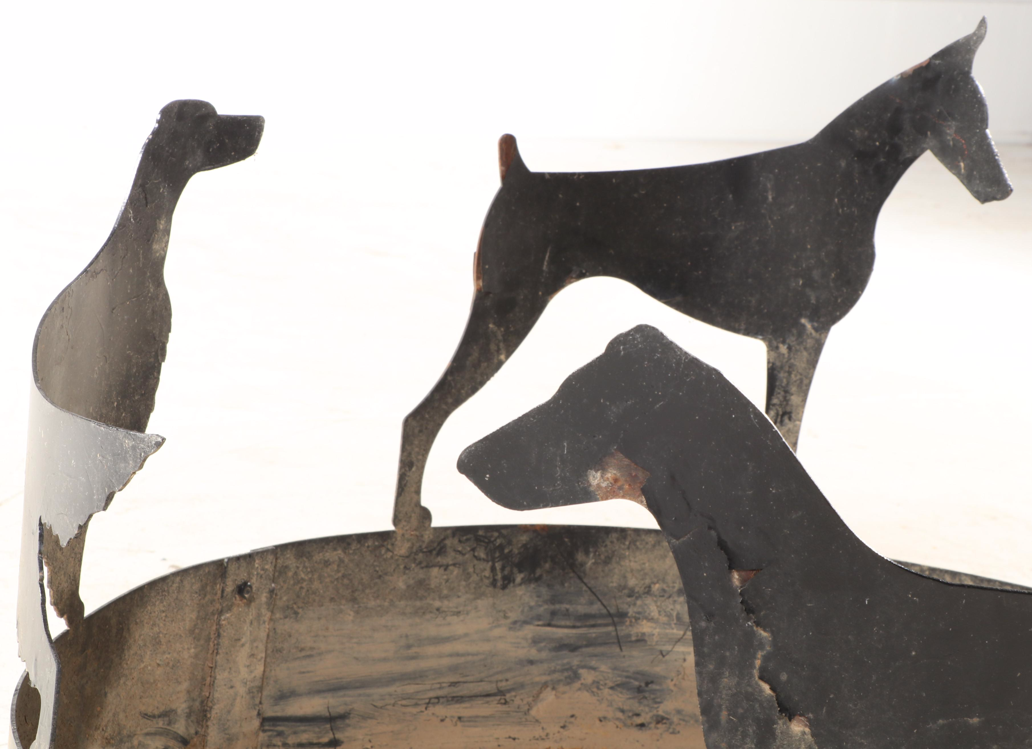 Black-Painted Sheet Metal Fire Pit Surround with Dog Cutouts