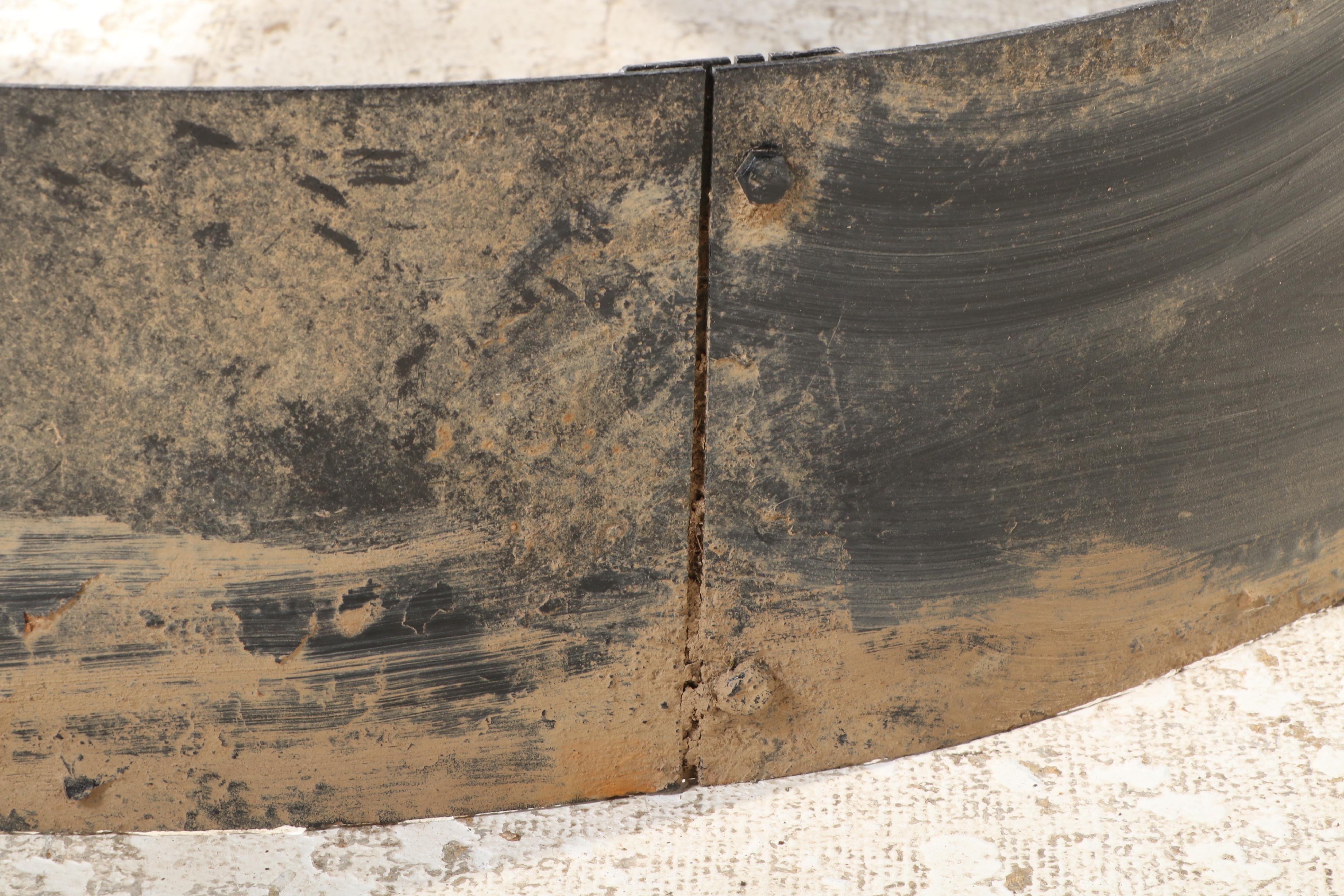 Black-Painted Sheet Metal Fire Pit Surround with Dog Cutouts