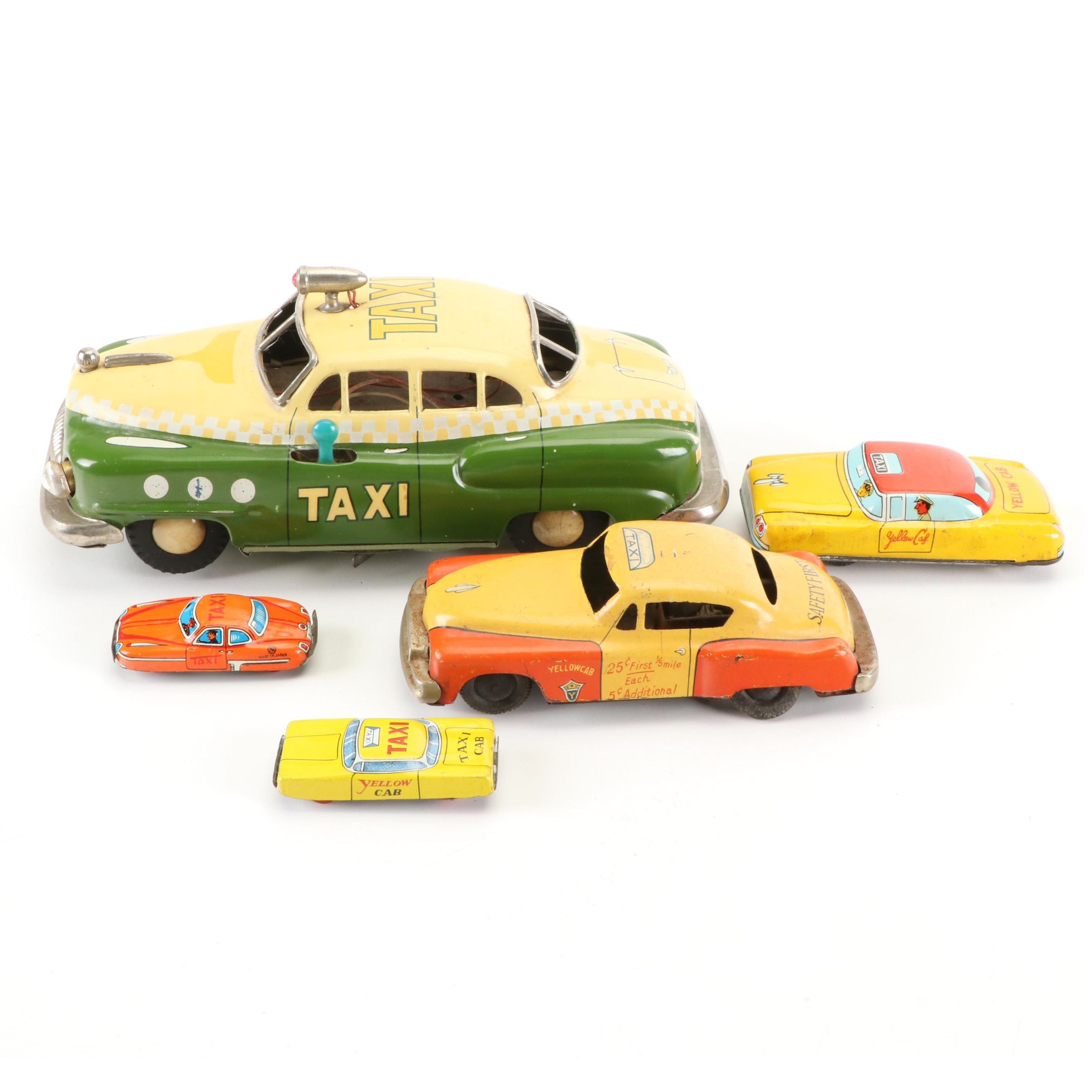 Mizuno Electromobile Tin Lithograph Battery Operated Taxi with Friction Cabs