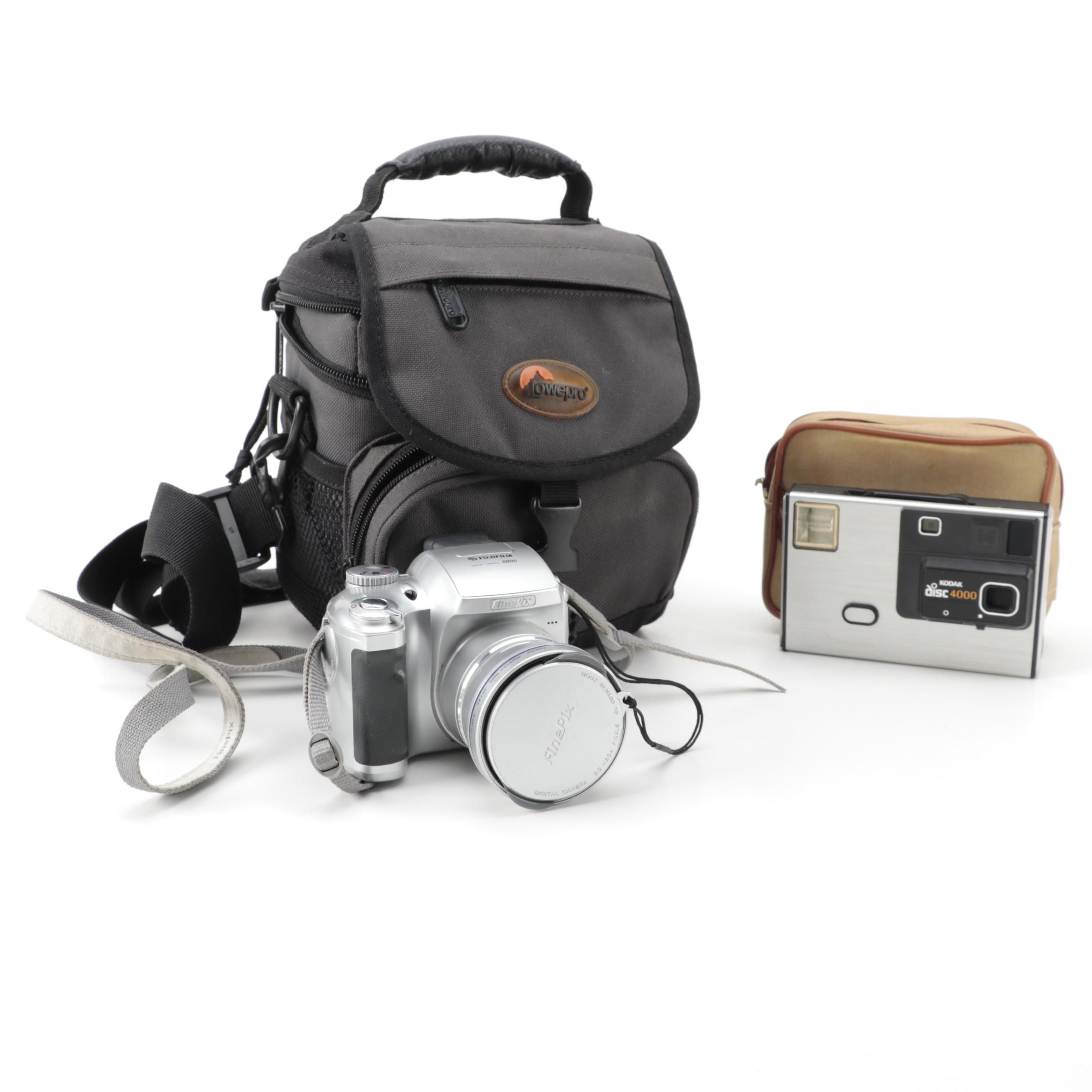 Kodak Disc 4000 Disc Camera and FujiFilm FinePix 3800 Digital Camera
