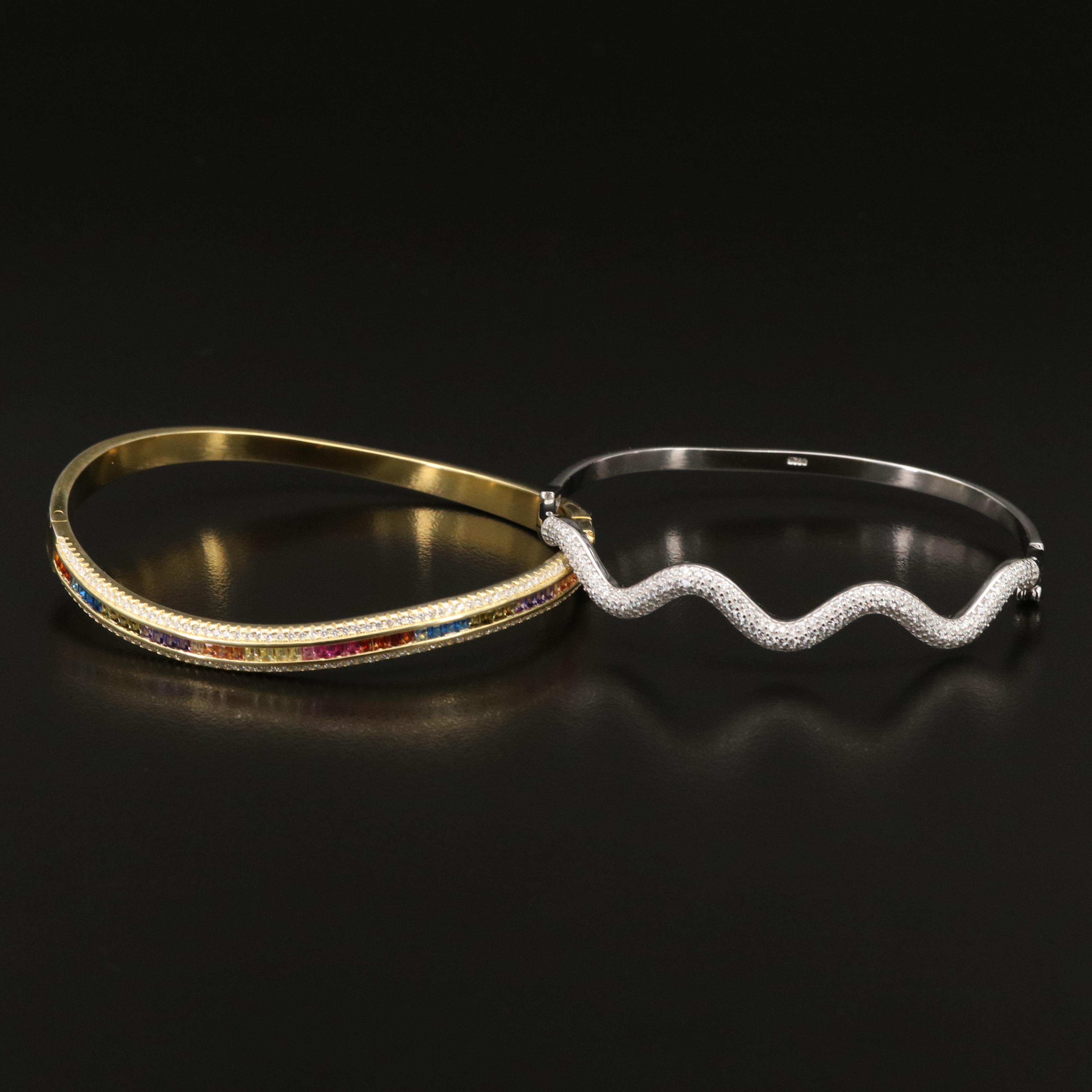 Pair of Gem Encrusted Hinged Bangles