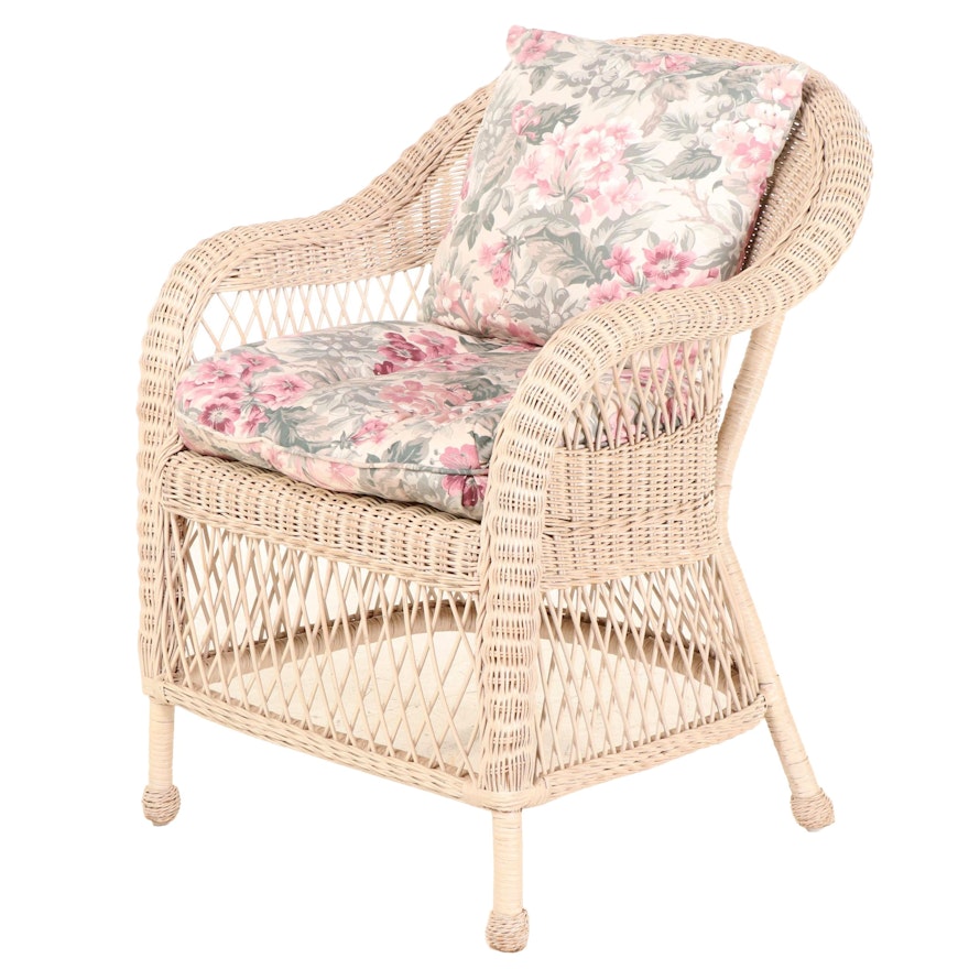 Wicker Armchair with Floral Print Cushion and Pillow