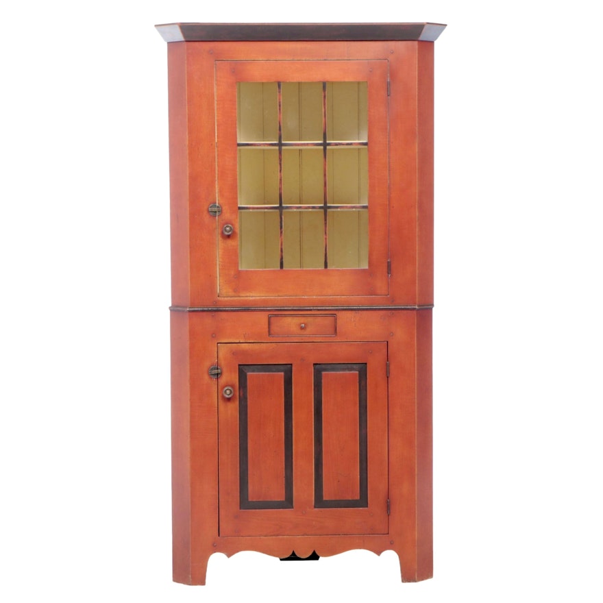 David T. Smith & Co. Red-Painted and Parcel-Ebonized Maple Corner Cupboard