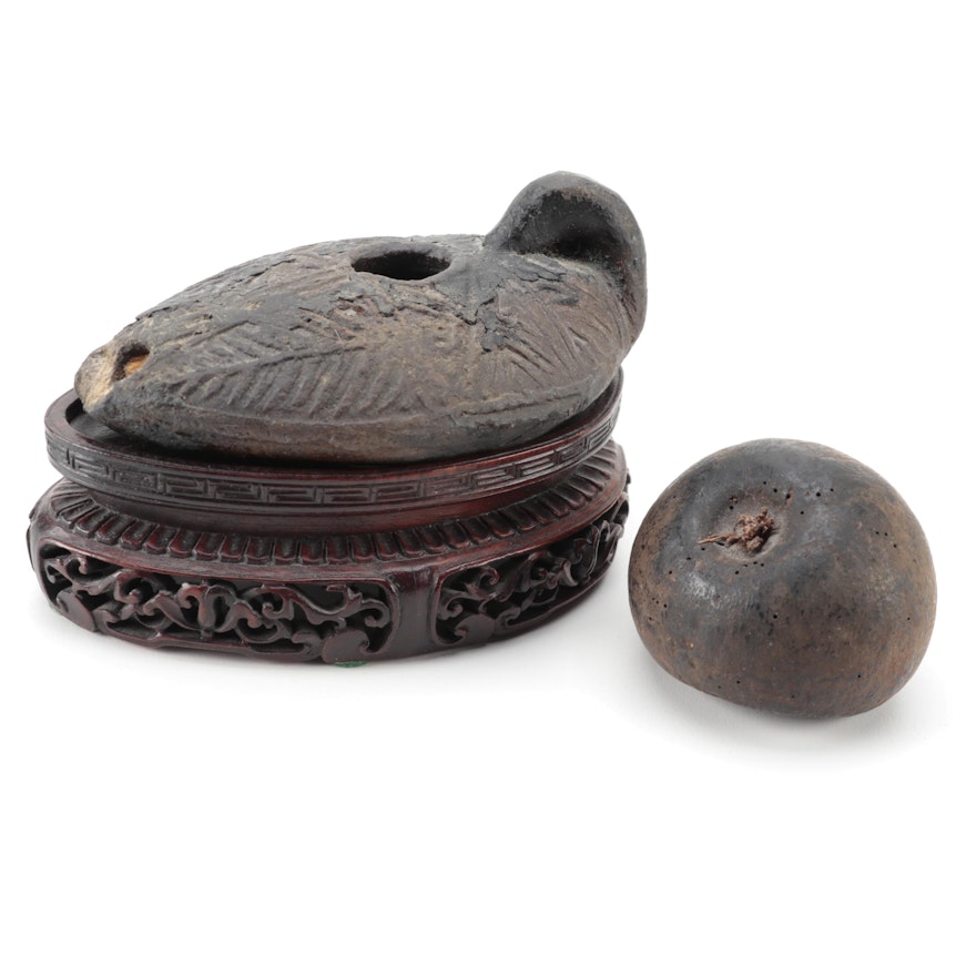 Persian Style Incised Earthenware Oil Lamp on Base with Petrified Apple