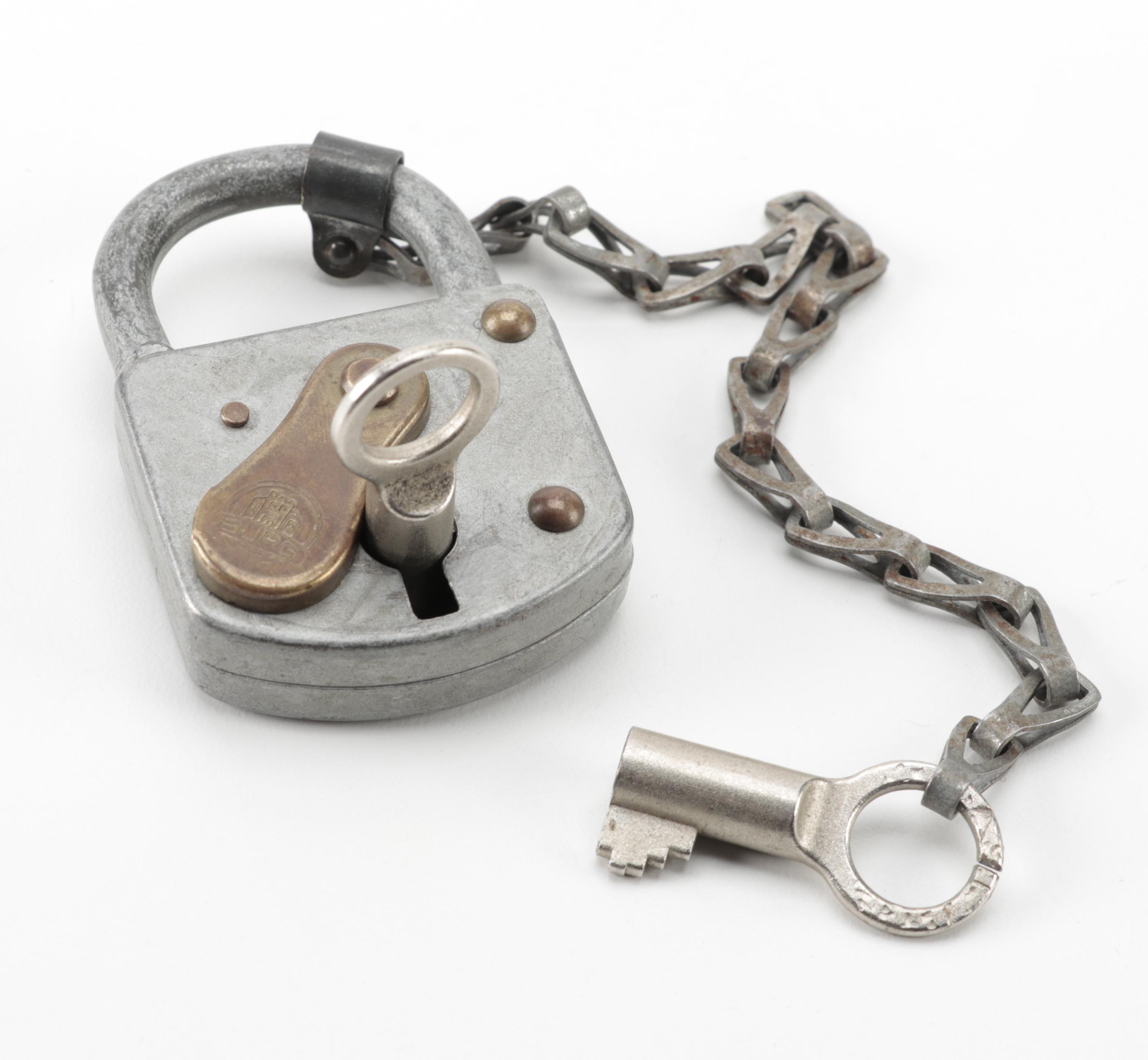 Argus Iron Claw Single Handcuff, Early 1930s, and Burg Padlock with Chain