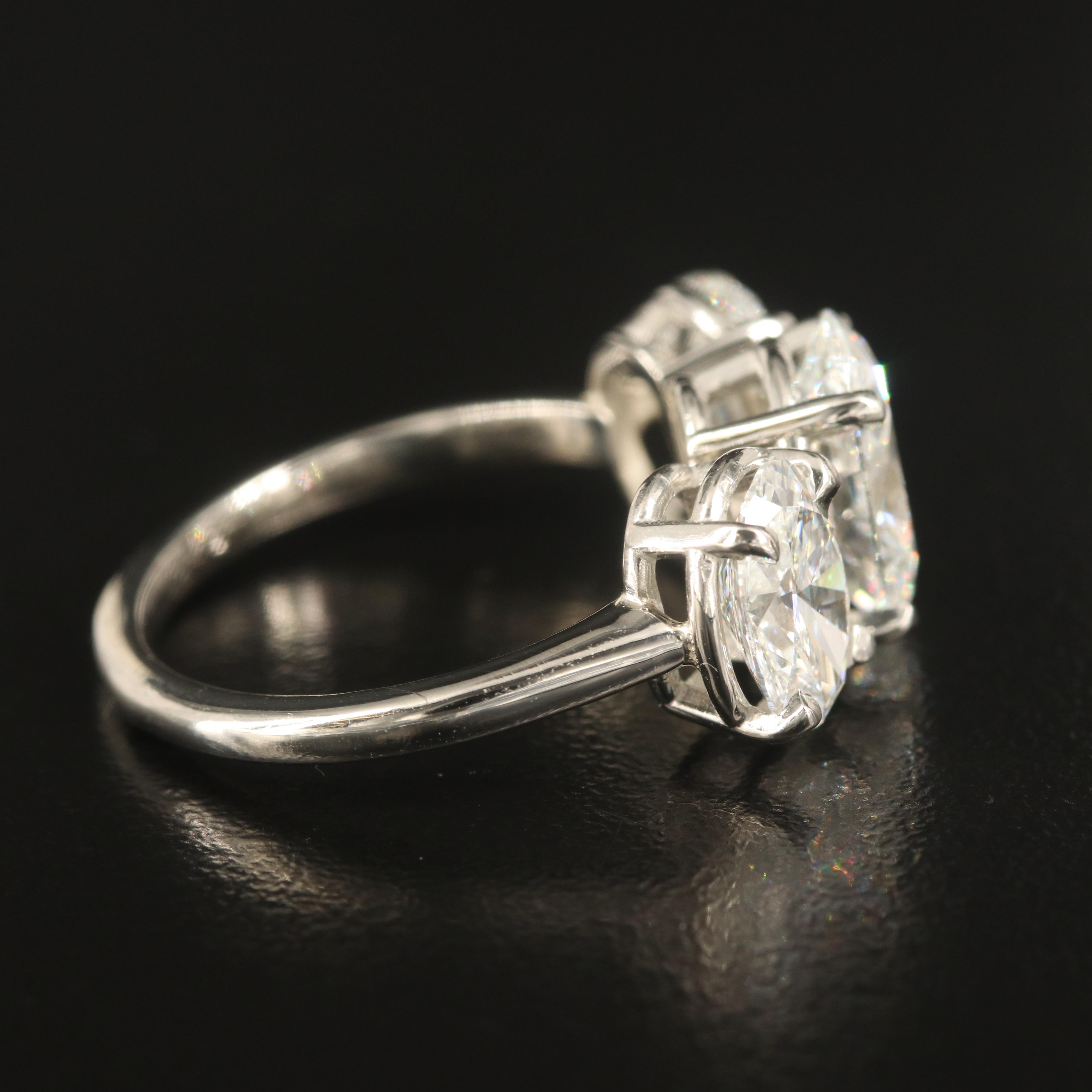 Platinum 4.28 CTW Diamond Three Stone Ring with IGI Reports