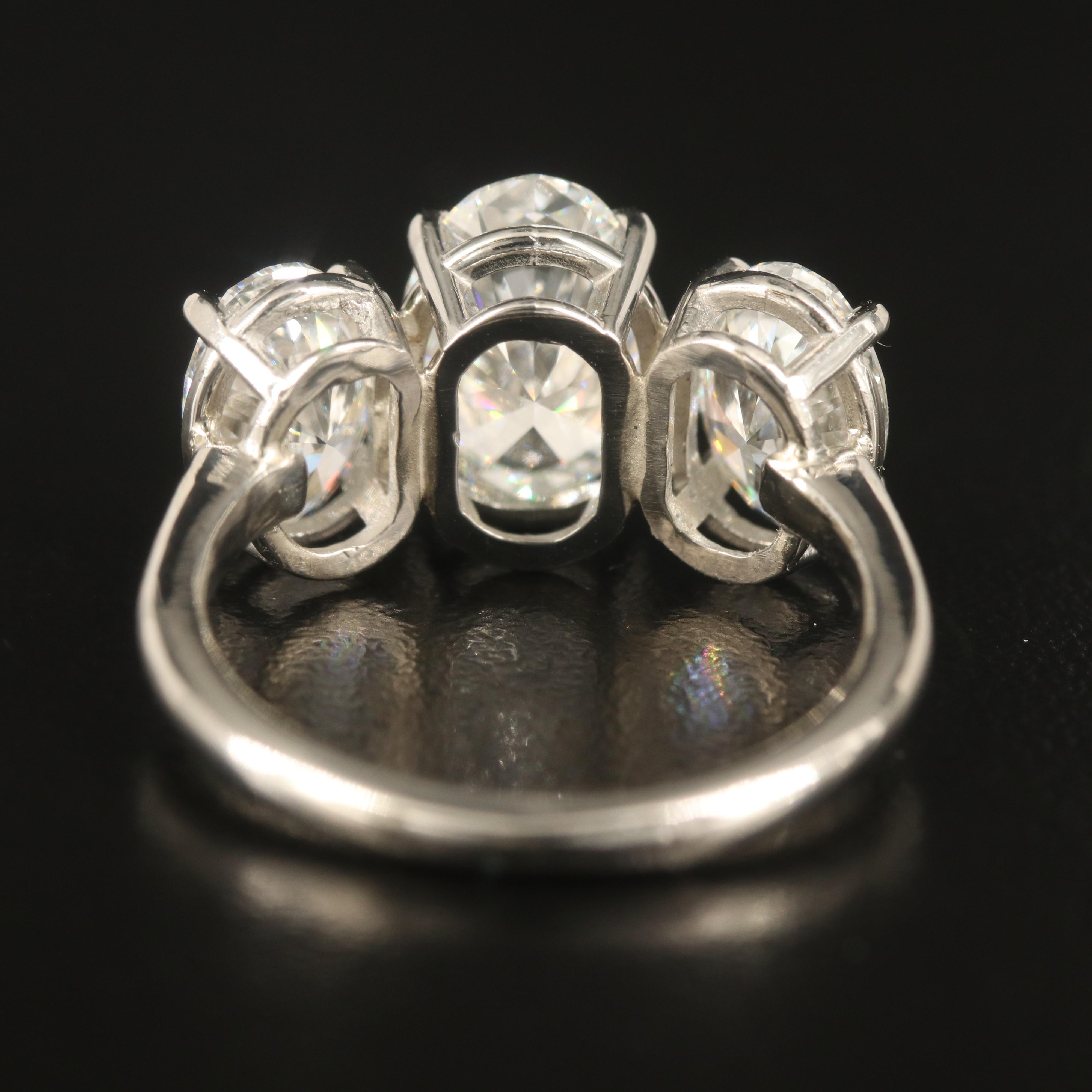 Platinum 4.28 CTW Diamond Three Stone Ring with IGI Reports