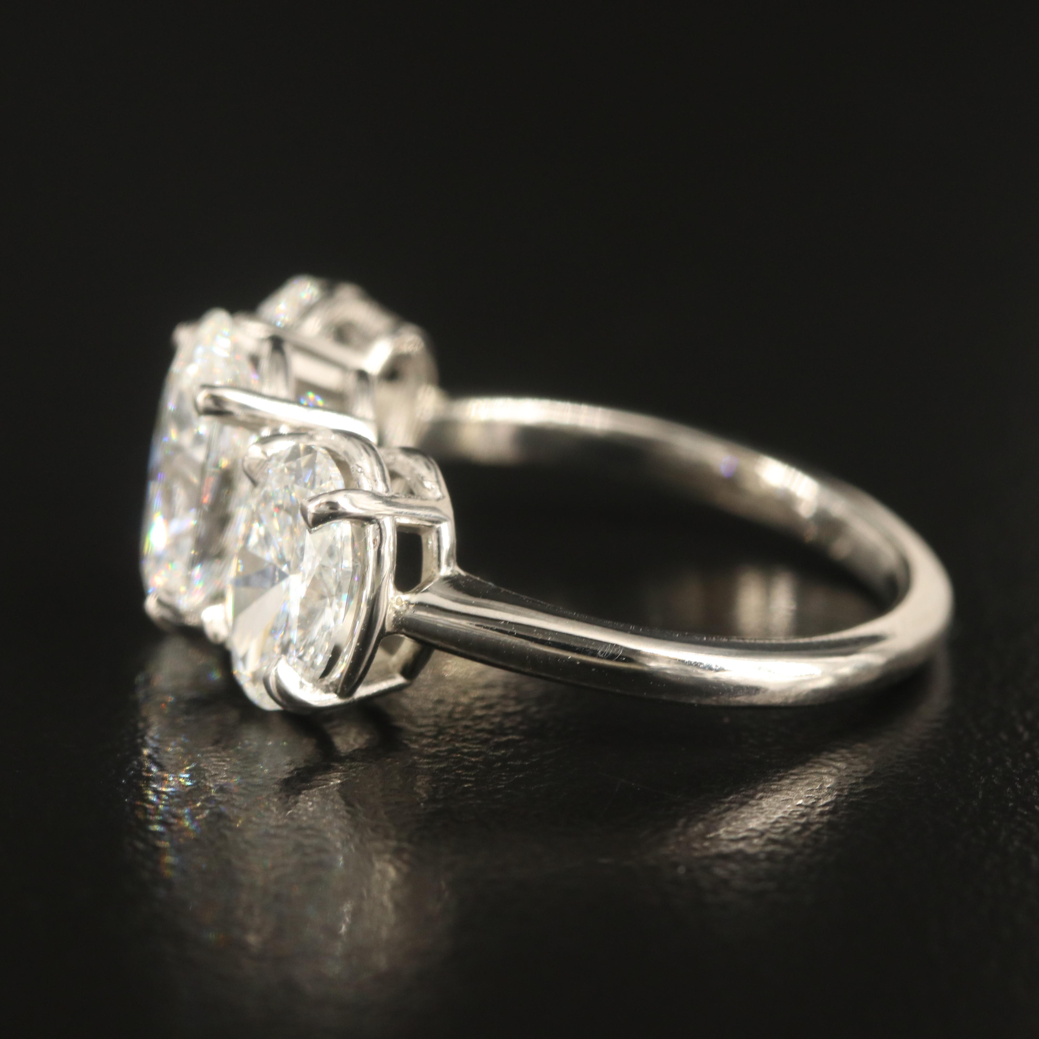 Platinum 4.28 CTW Diamond Three Stone Ring with IGI Reports