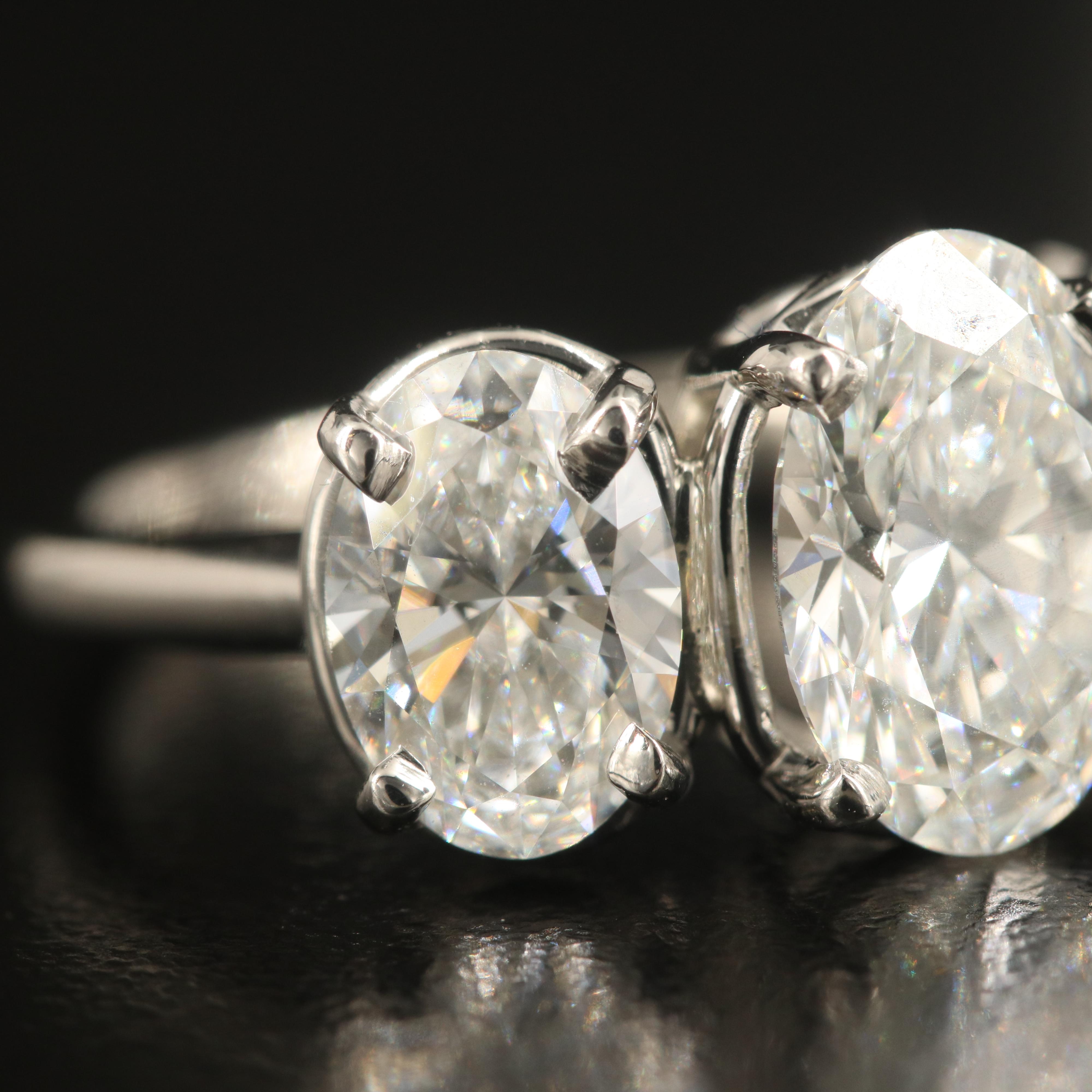 Platinum 4.28 CTW Diamond Three Stone Ring with IGI Reports