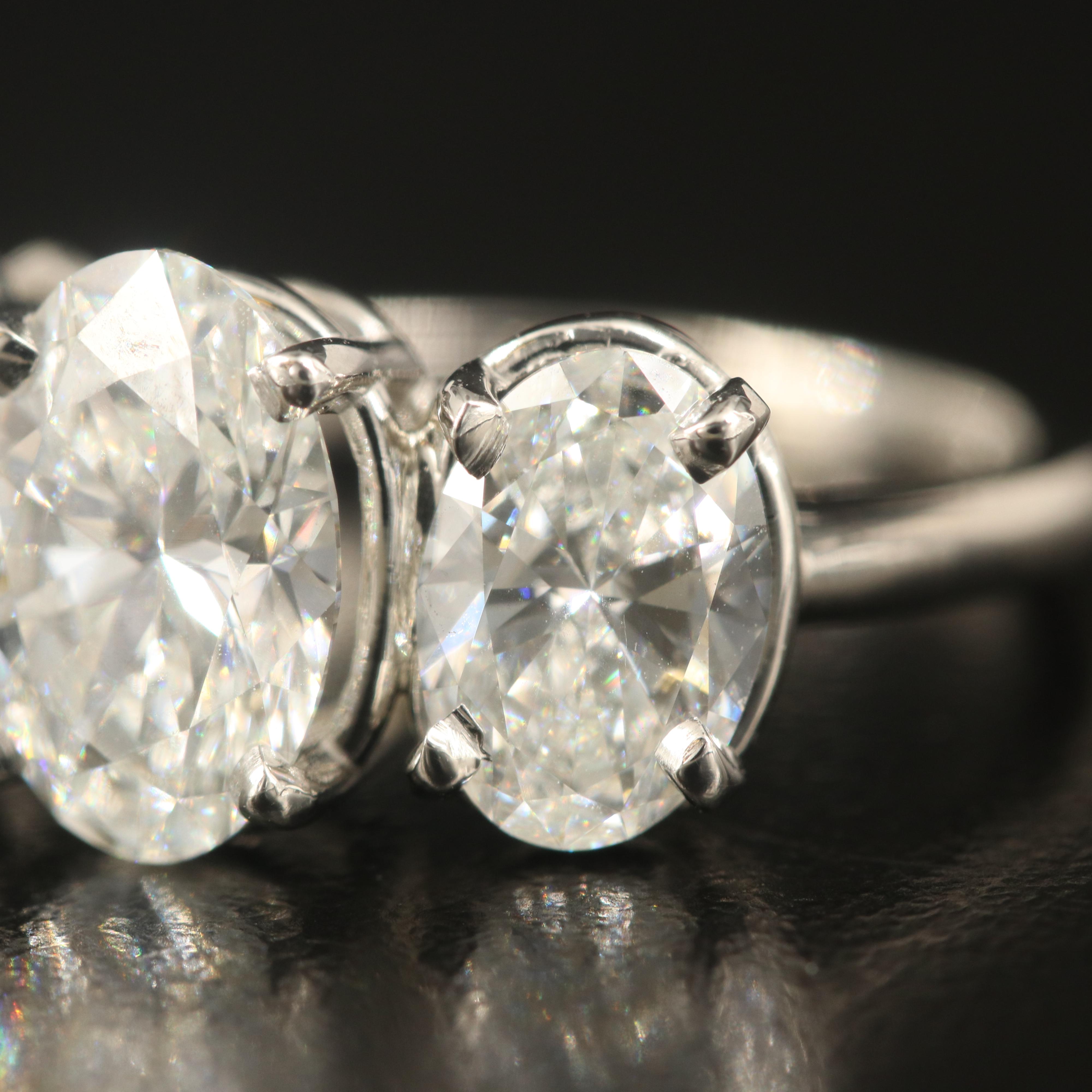 Platinum 4.28 CTW Diamond Three Stone Ring with IGI Reports