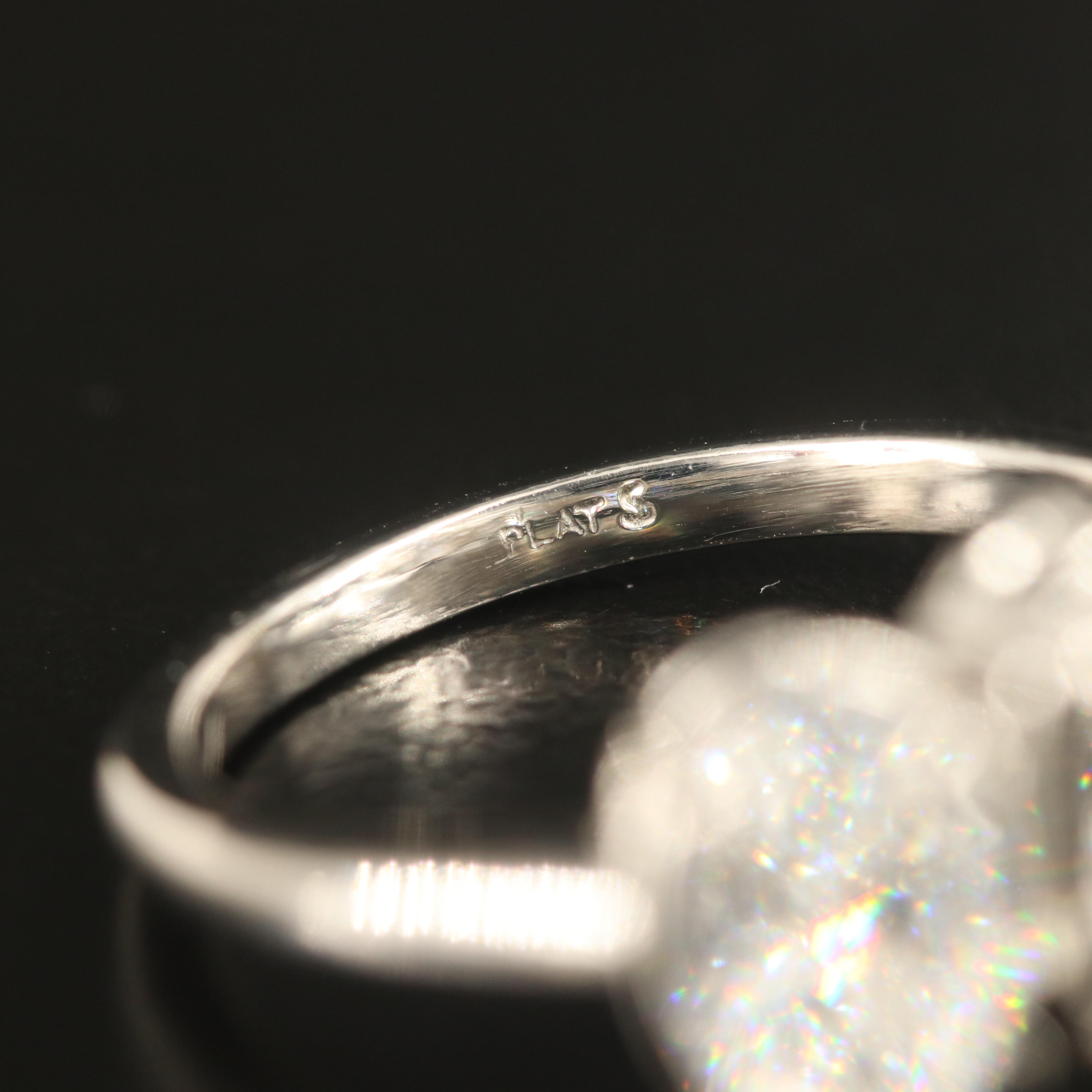 Platinum 4.28 CTW Diamond Three Stone Ring with IGI Reports