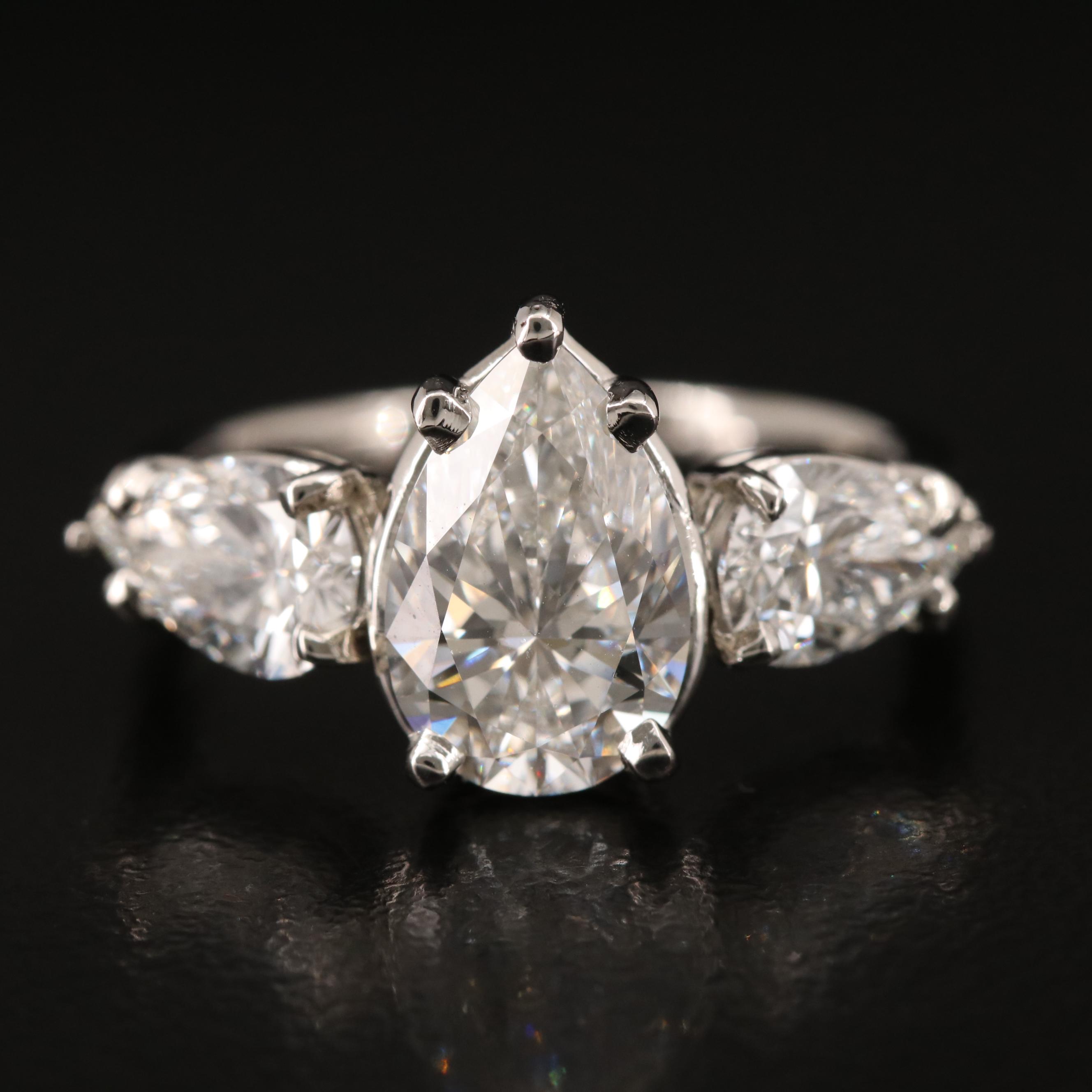 Platinum Three Stone 3.71 CTW Diamond Ring with IGI Reports