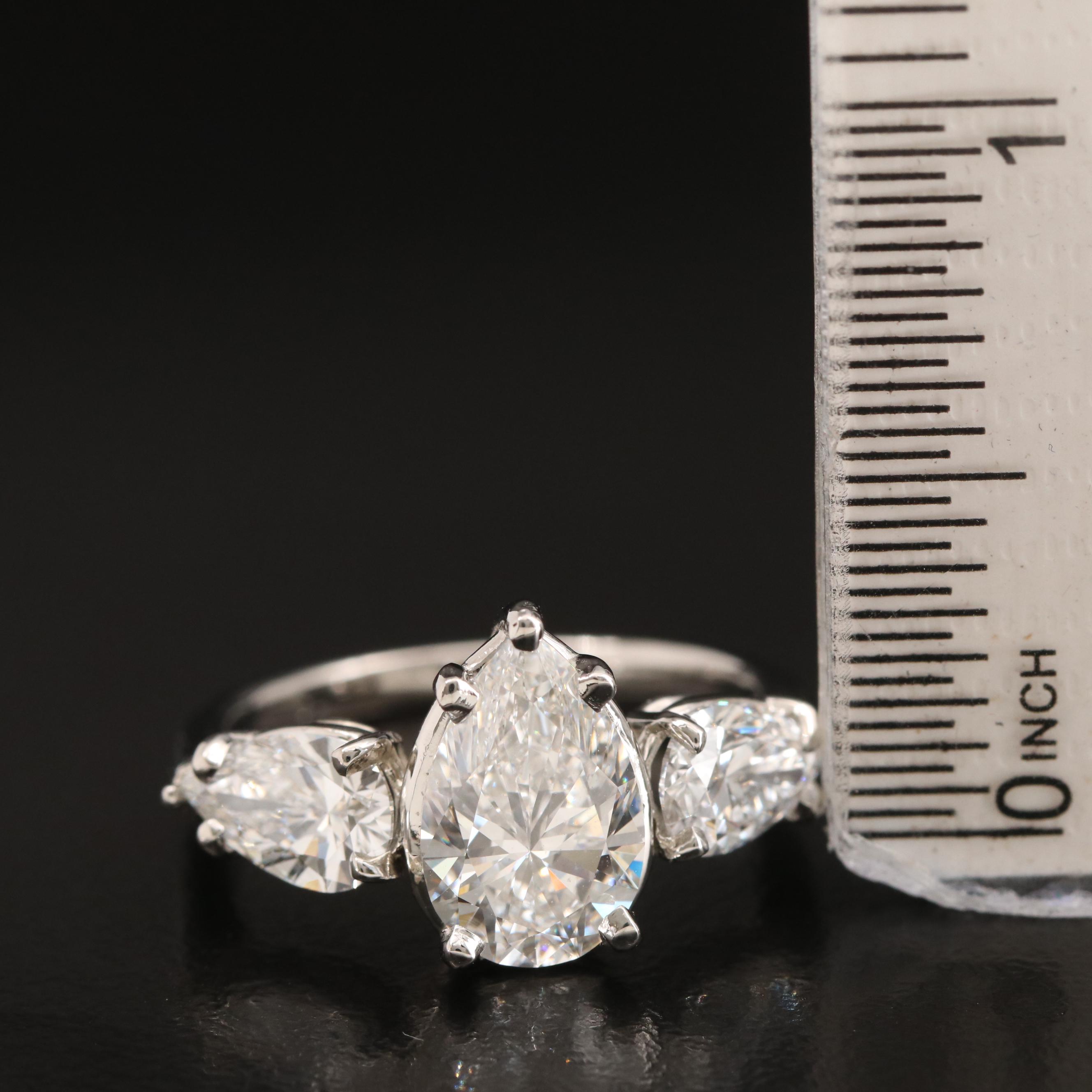 Platinum Three Stone 3.71 CTW Diamond Ring with IGI Reports