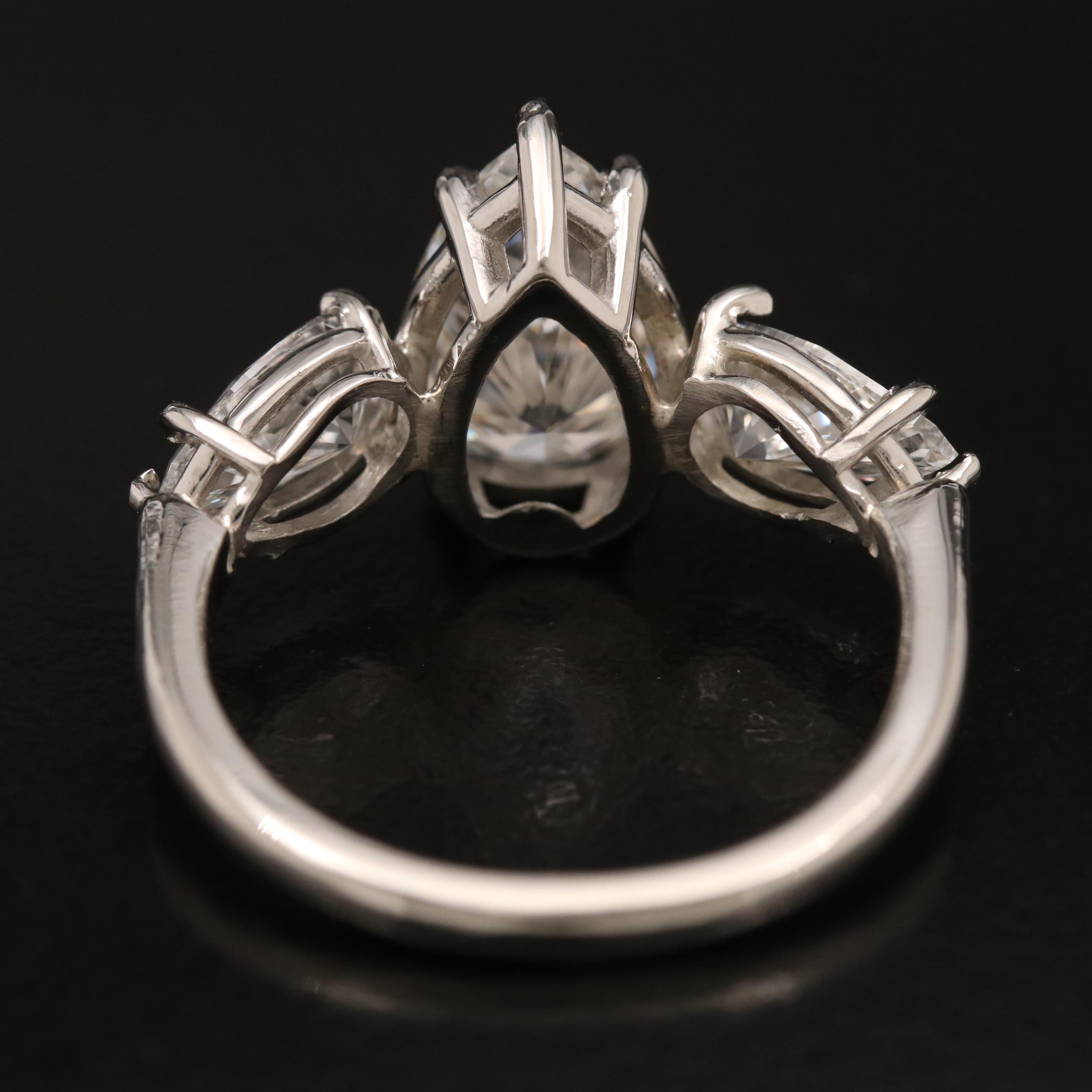 Platinum Three Stone 3.71 CTW Diamond Ring with IGI Reports