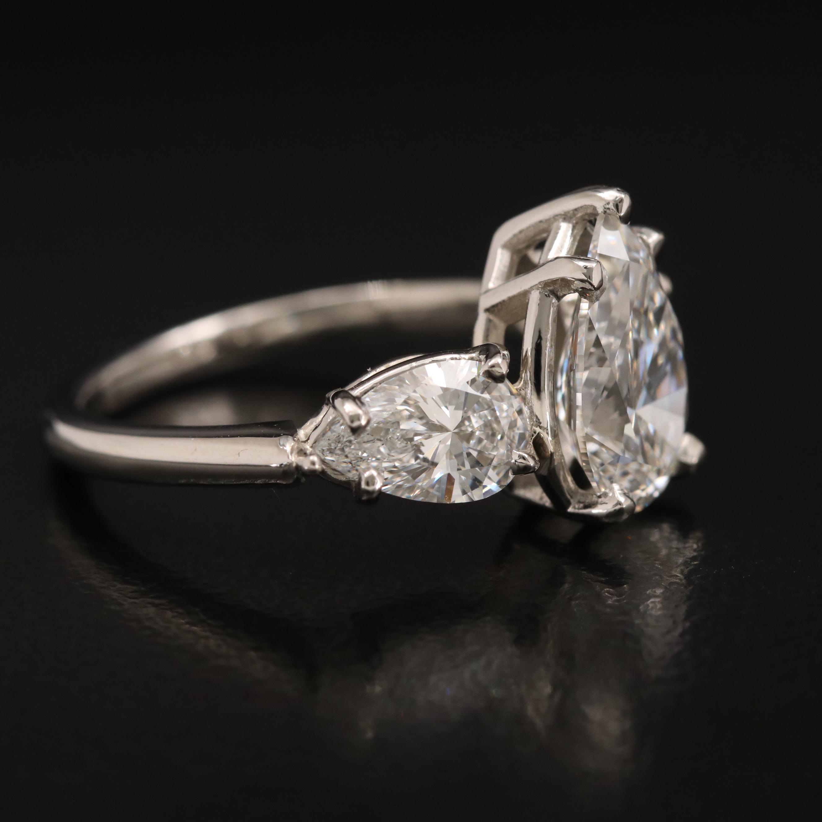 Platinum Three Stone 3.71 CTW Diamond Ring with IGI Reports