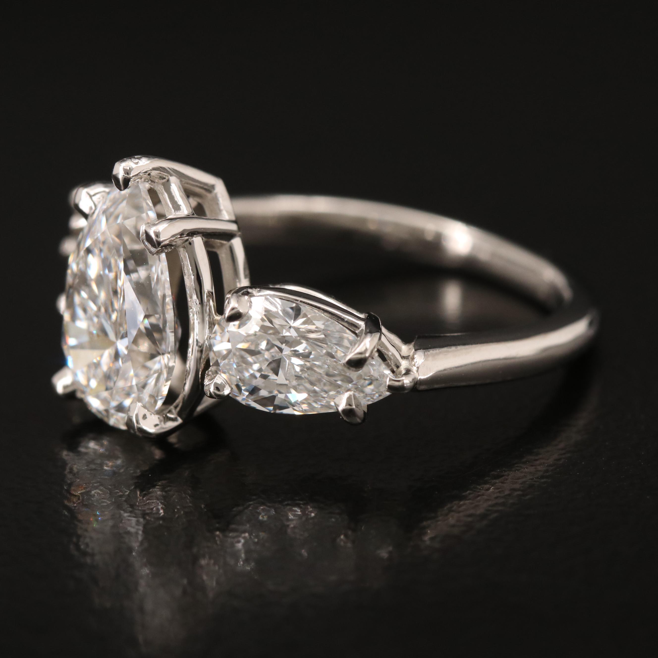 Platinum Three Stone 3.71 CTW Diamond Ring with IGI Reports