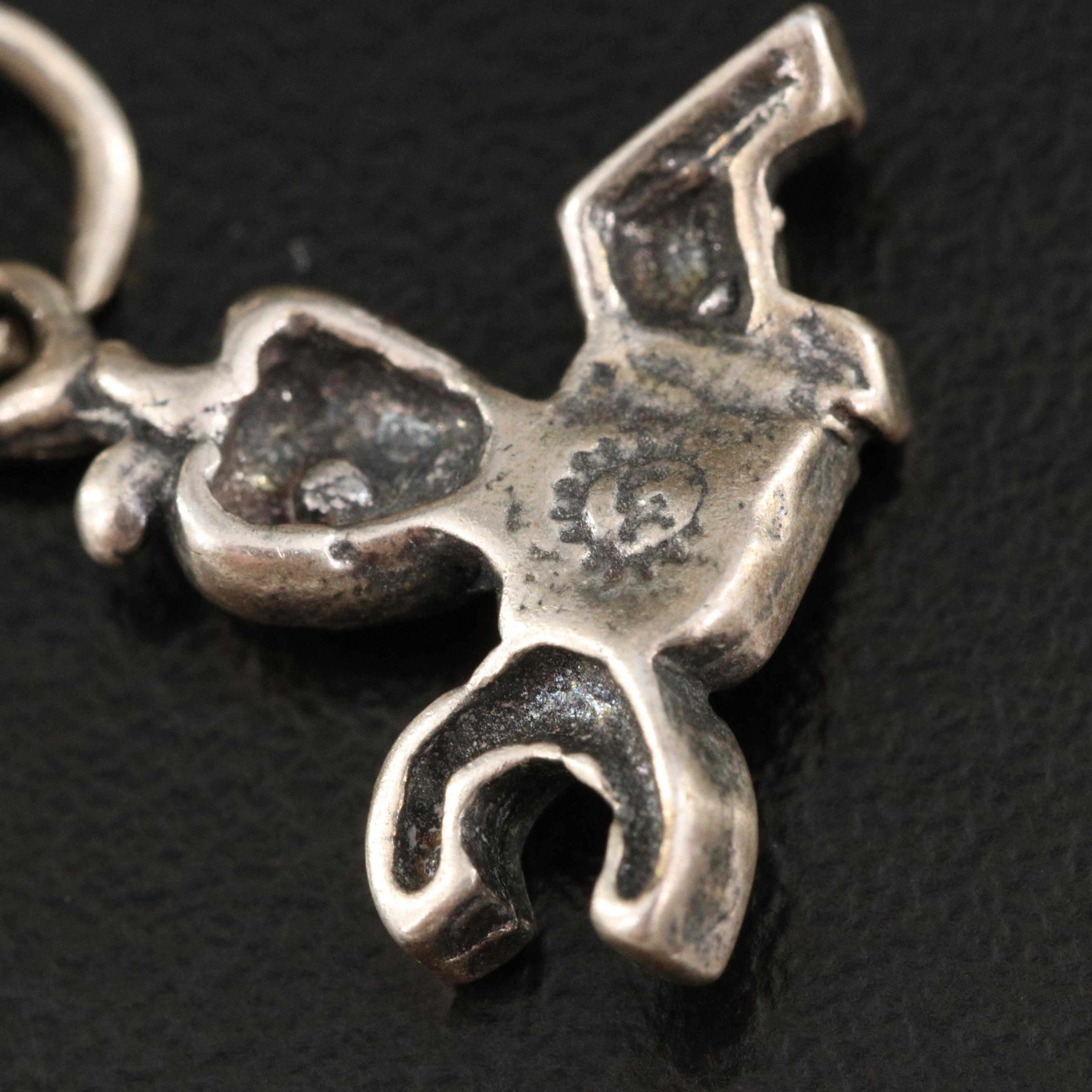 Vintage Charm Bracelets Including Sterling, Jadeite and Howlite