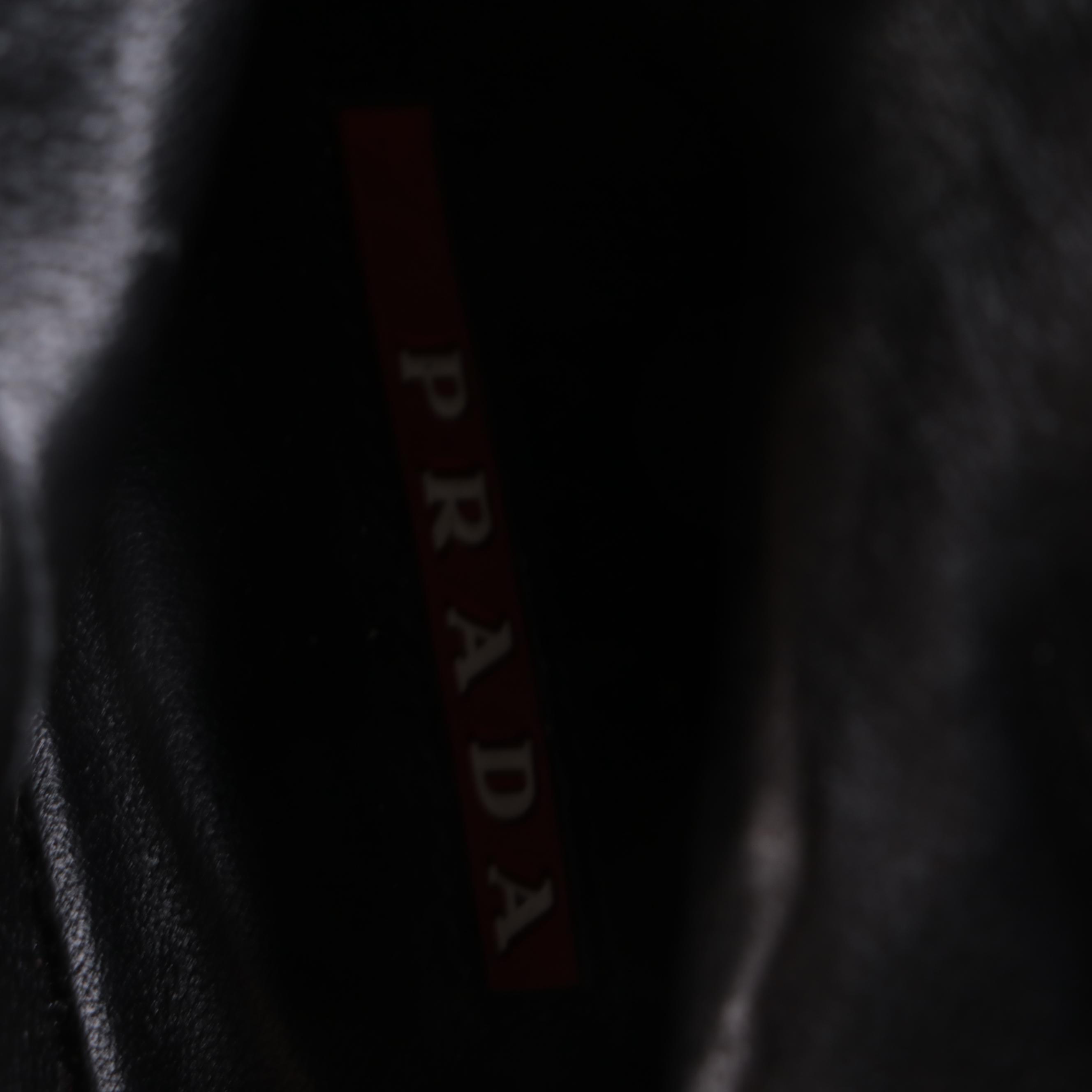 Prada Linea Rossa Crinkle Patent Leather Wedge Boots