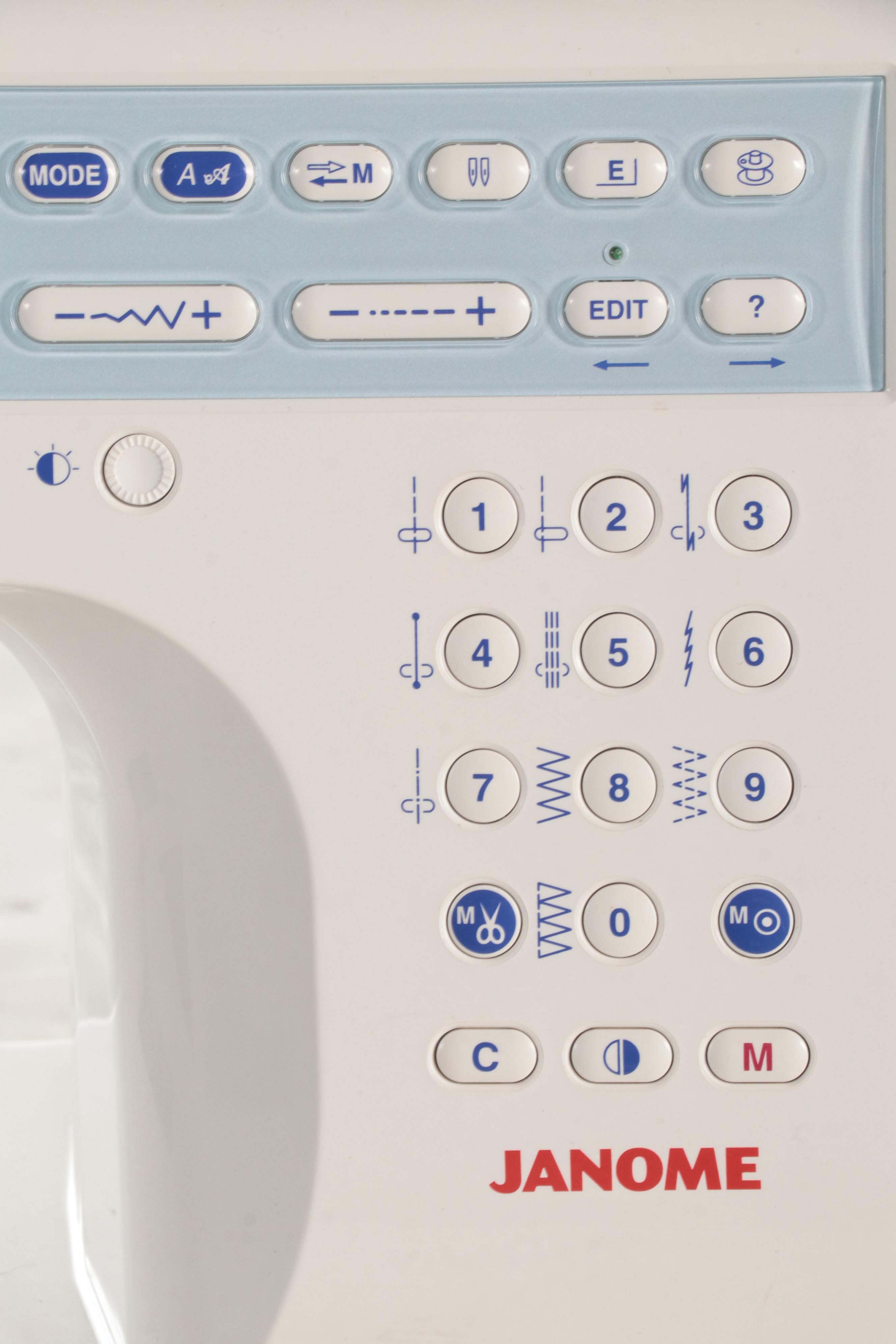 Janome Sewing Machine with Travel Case and Accessories