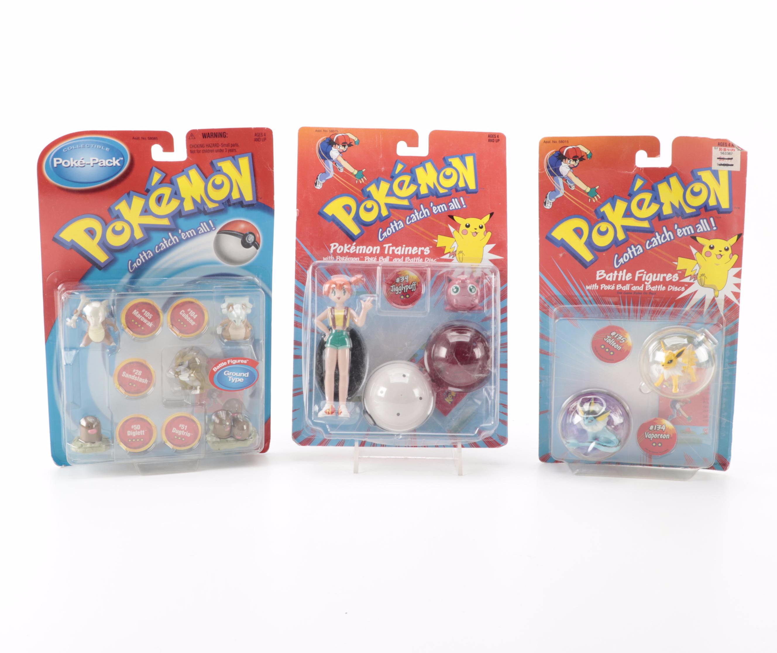 Poké Ball Blaster, Grabber Ball and Other Unopened Pokémon Figures and Toys