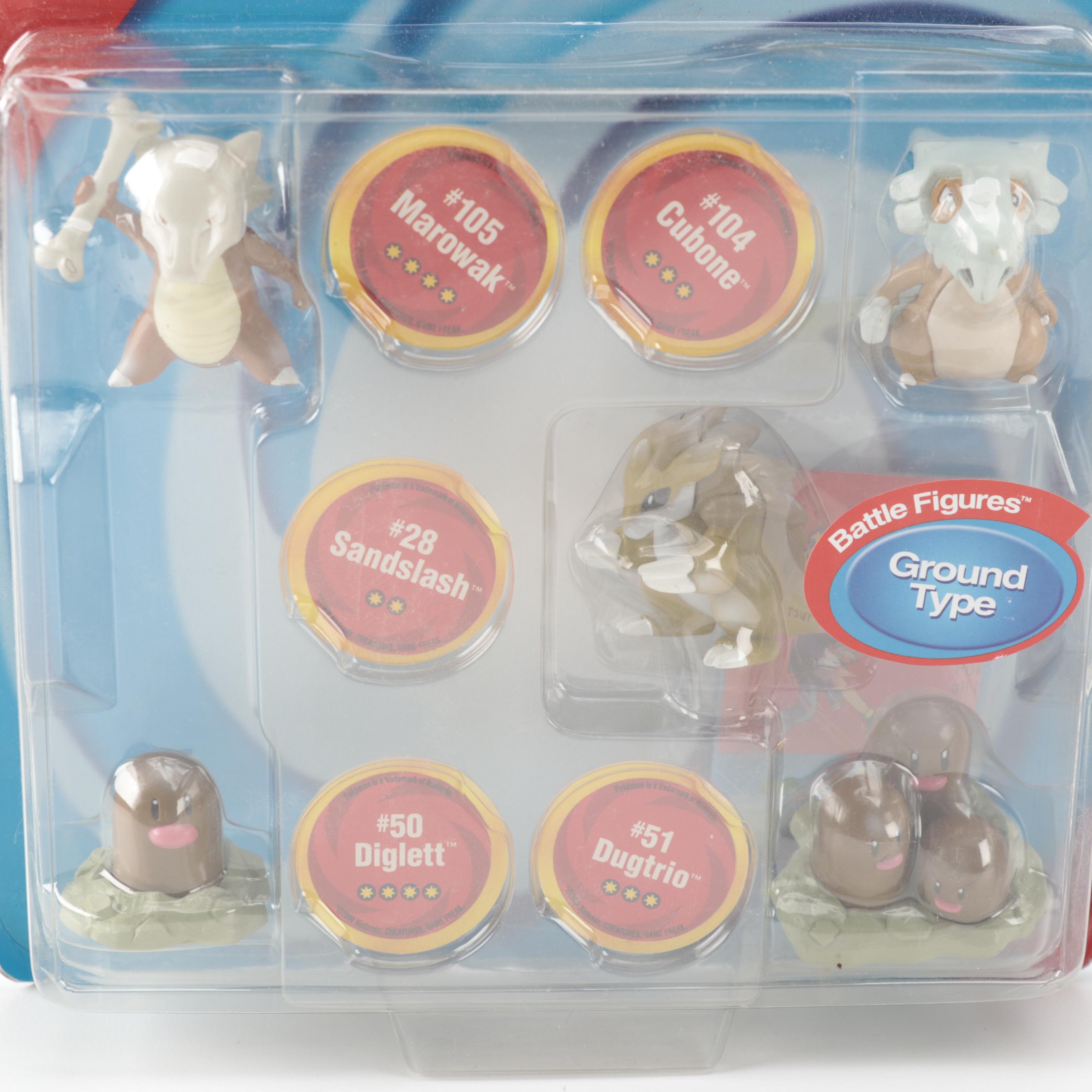 Poké Ball Blaster, Grabber Ball and Other Unopened Pokémon Figures and Toys