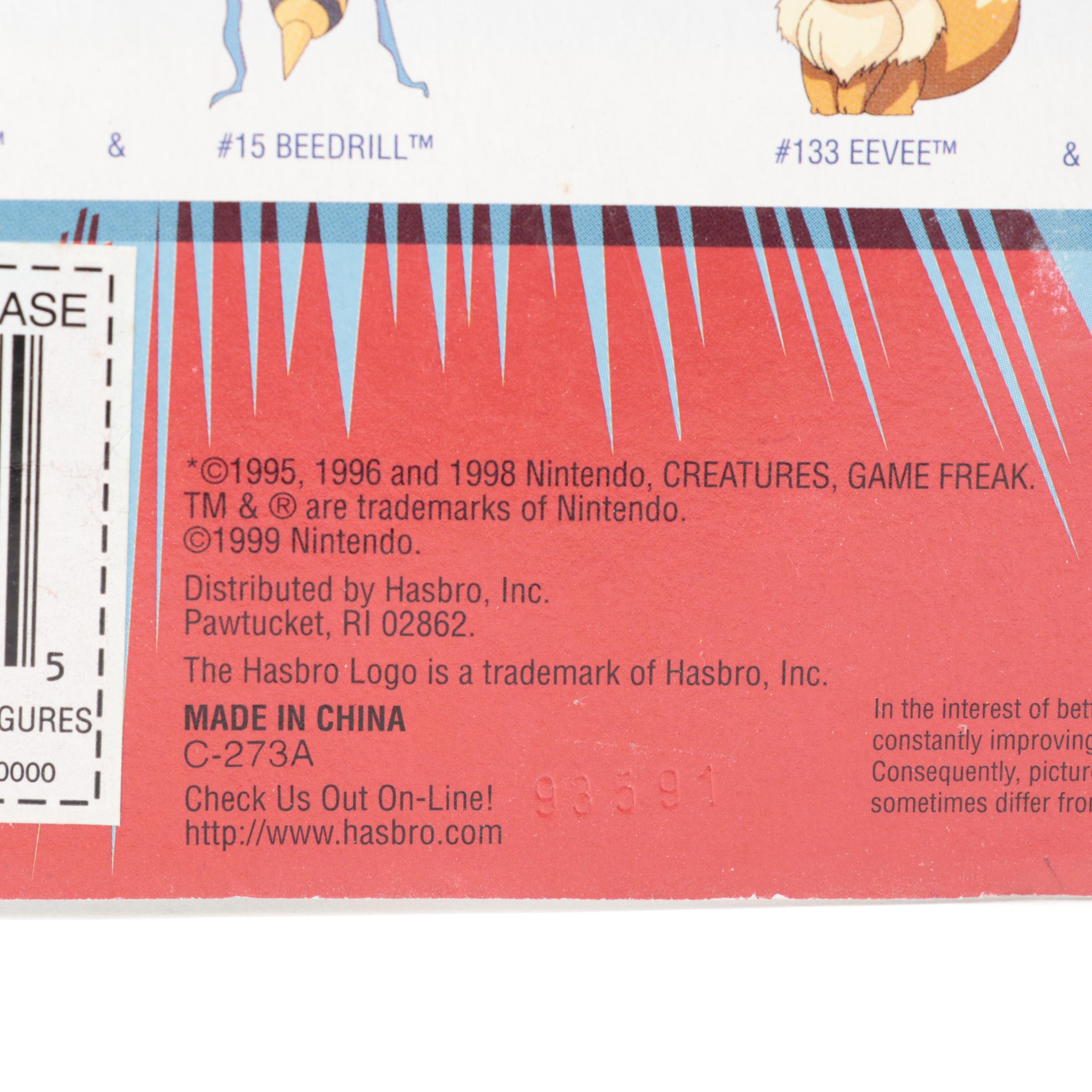 Poké Ball Blaster, Grabber Ball and Other Unopened Pokémon Figures and Toys