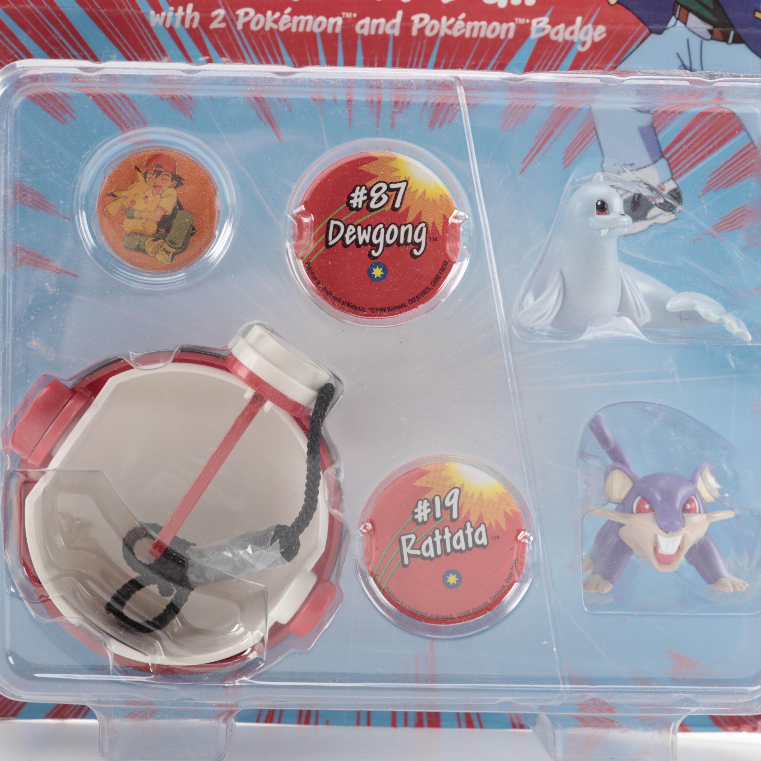 Poké Ball Blaster, Grabber Ball and Other Unopened Pokémon Figures and Toys