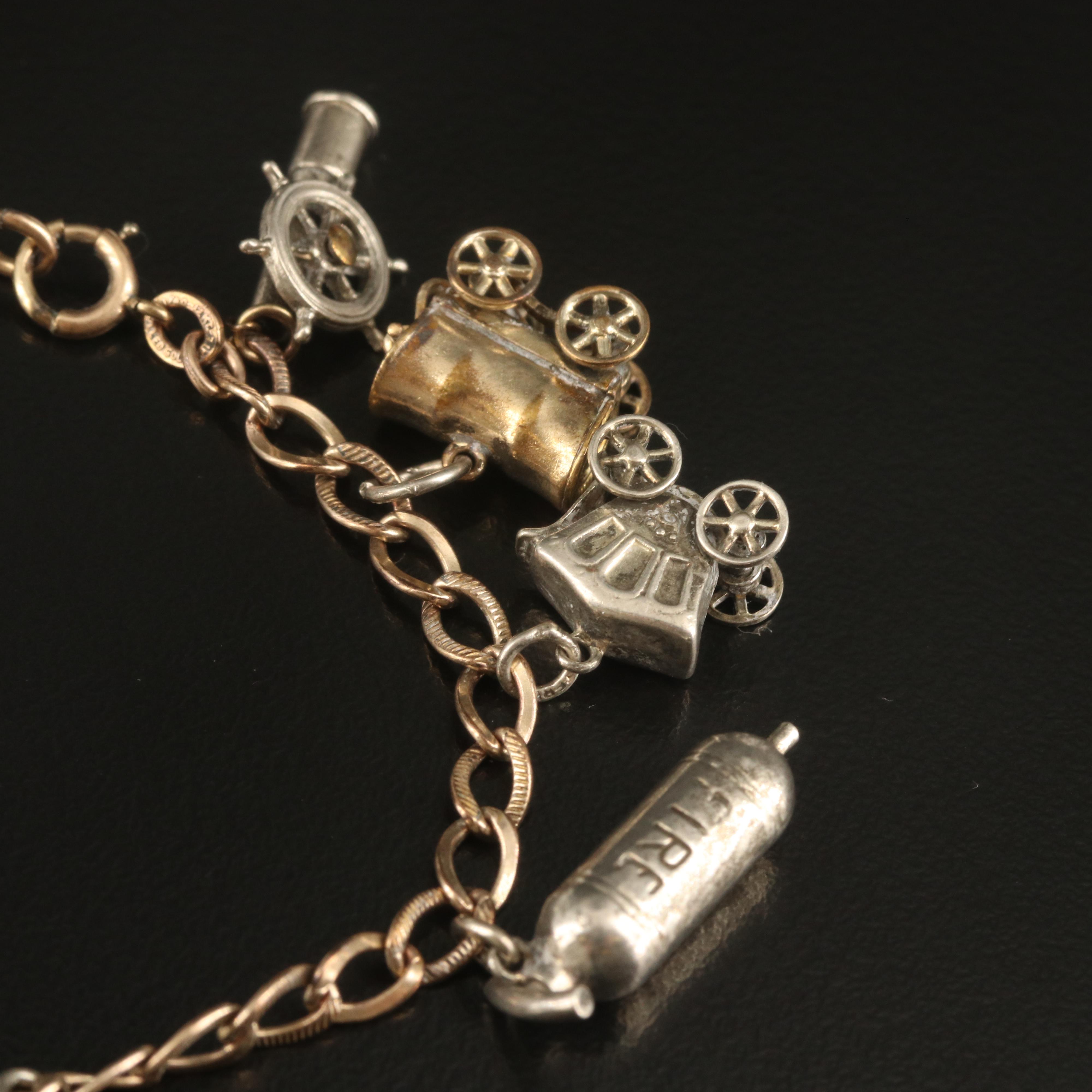 Charm Bracelet with Serpent and Windmill Charms