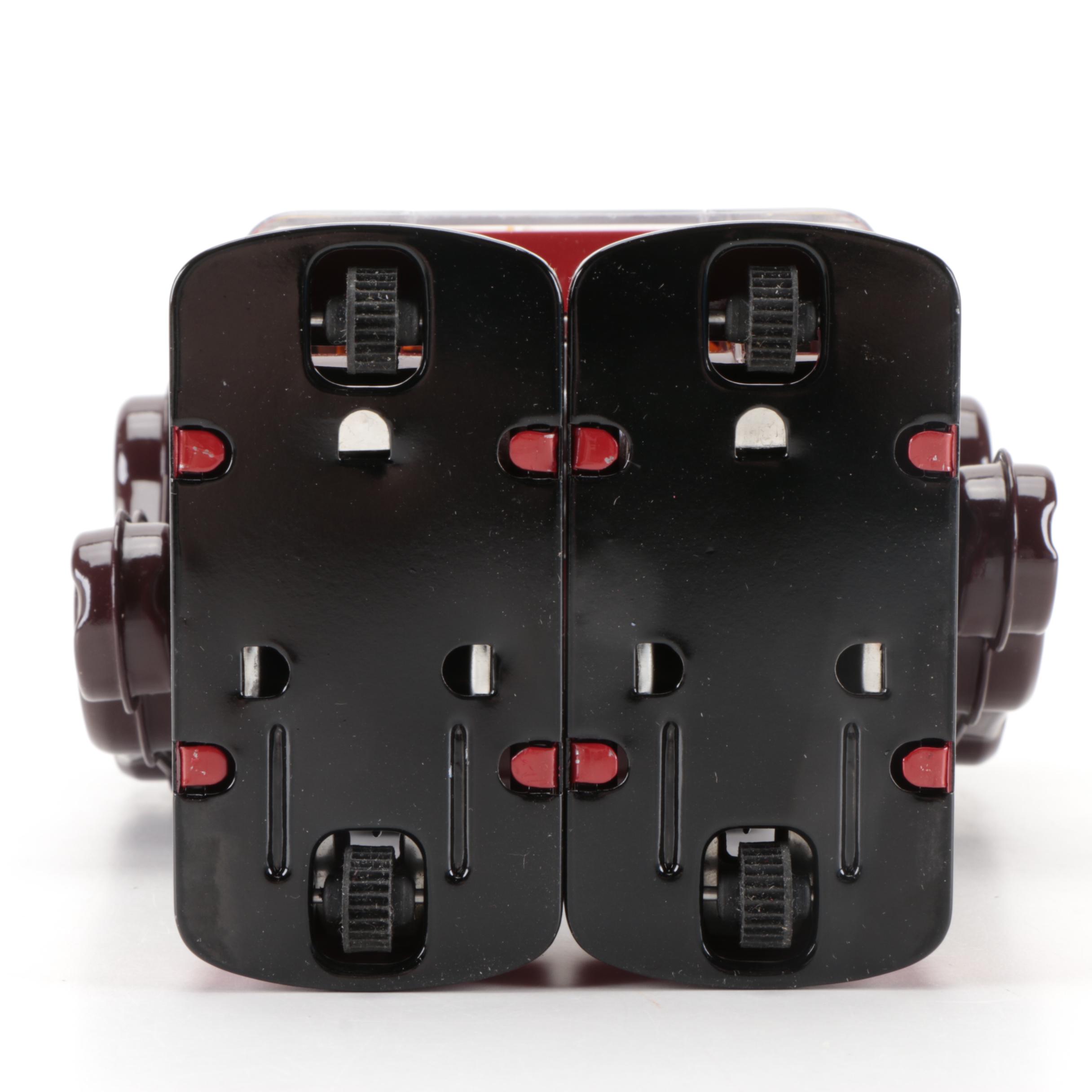 Metal House Piston Robot III Battery-Operated Tin Litho Toy