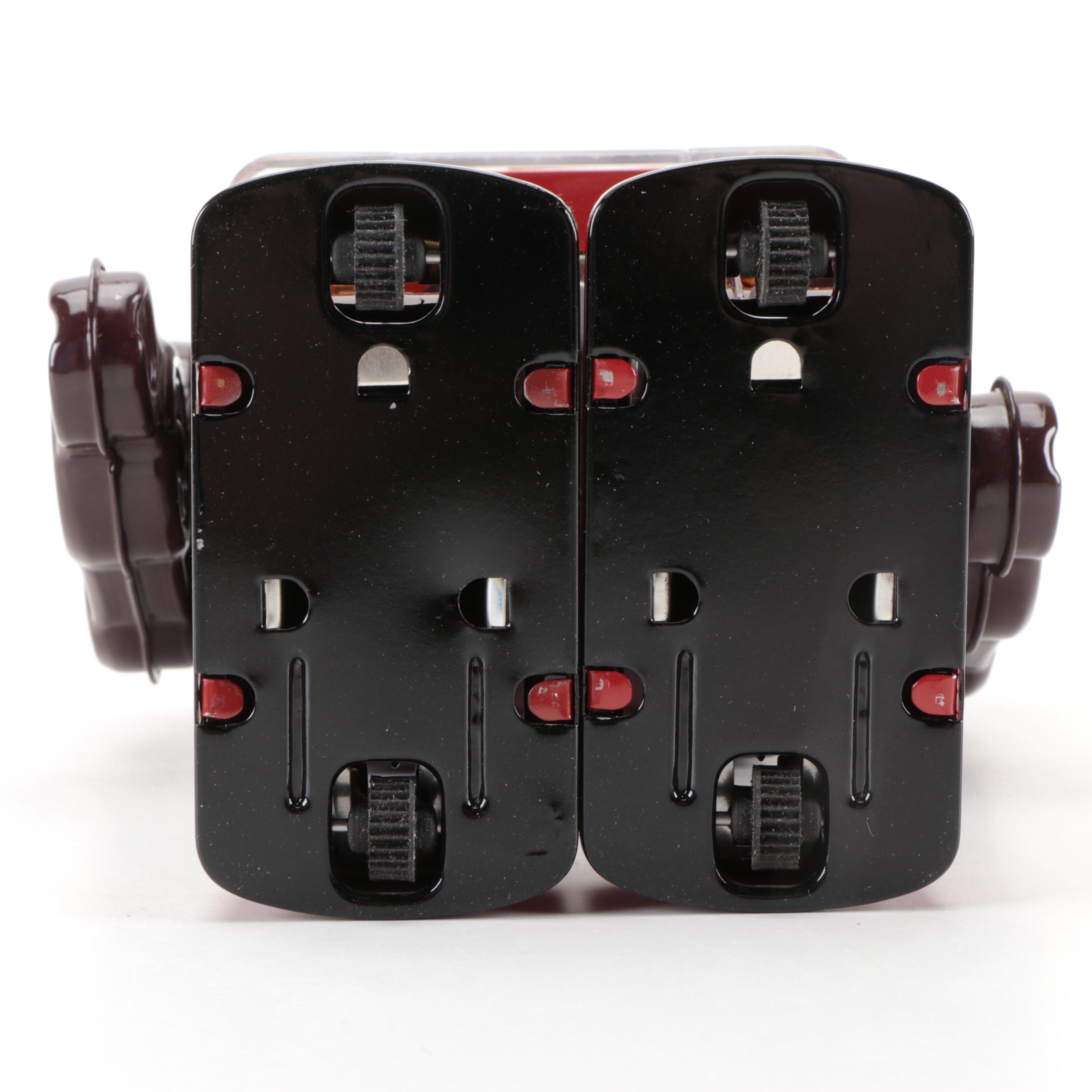 Metal House Piston Robot III Battery-Operated Tin Litho Toy