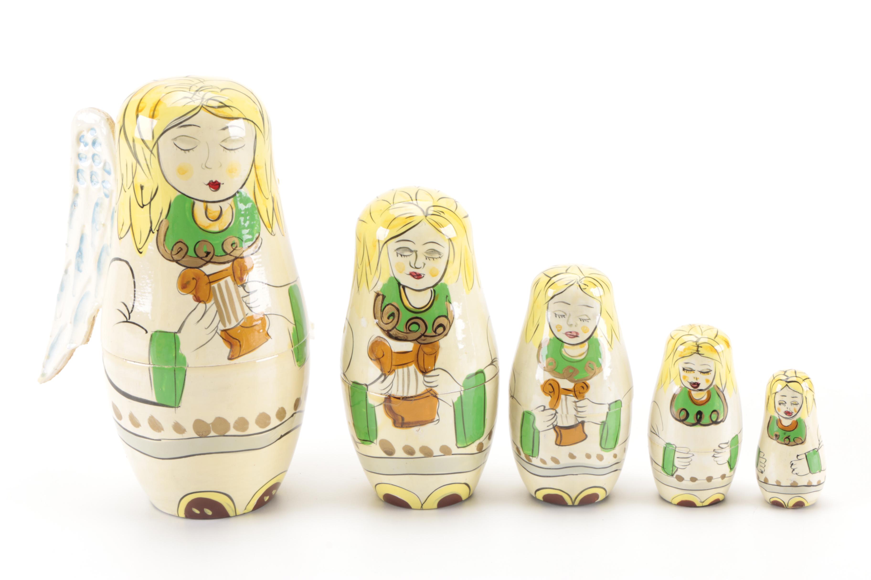 Matroyshka Nesting Dolls "Angel", "Cat", and "Rocket Boy"