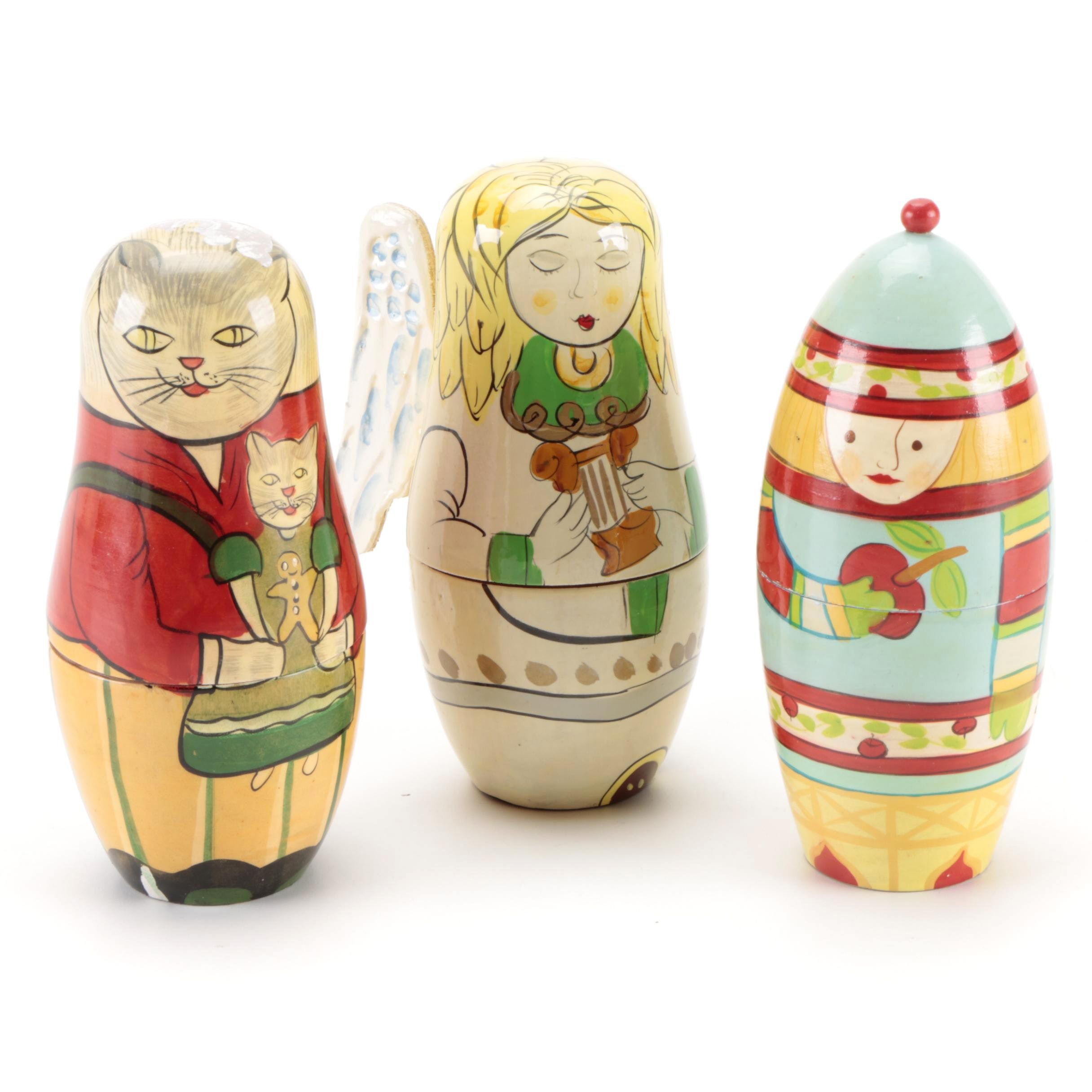 Matroyshka Nesting Dolls "Angel", "Cat", and "Rocket Boy"