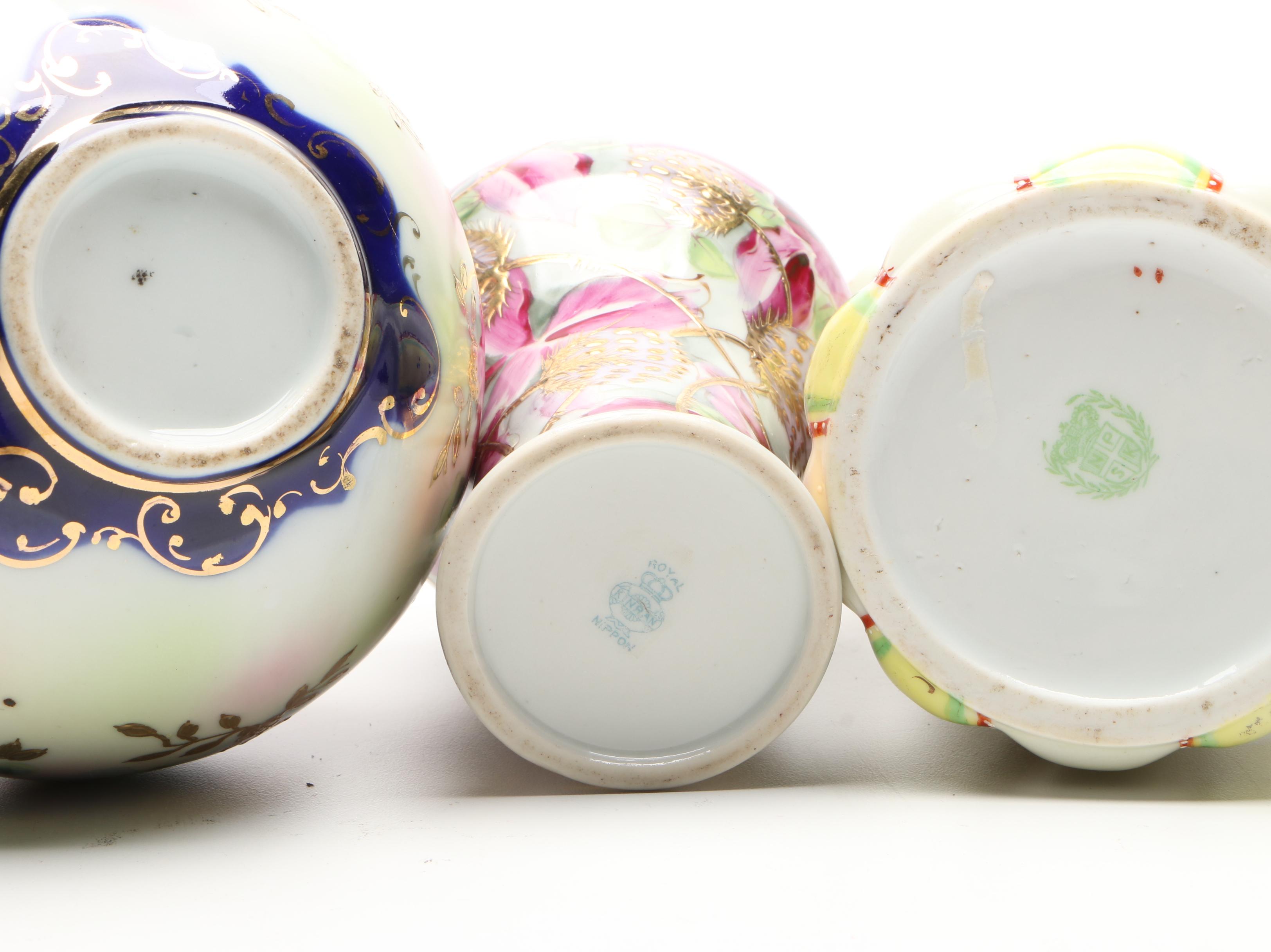 Japanese Porcelain Moriage Accented Vases and Chocolate Pot with Other Shakers