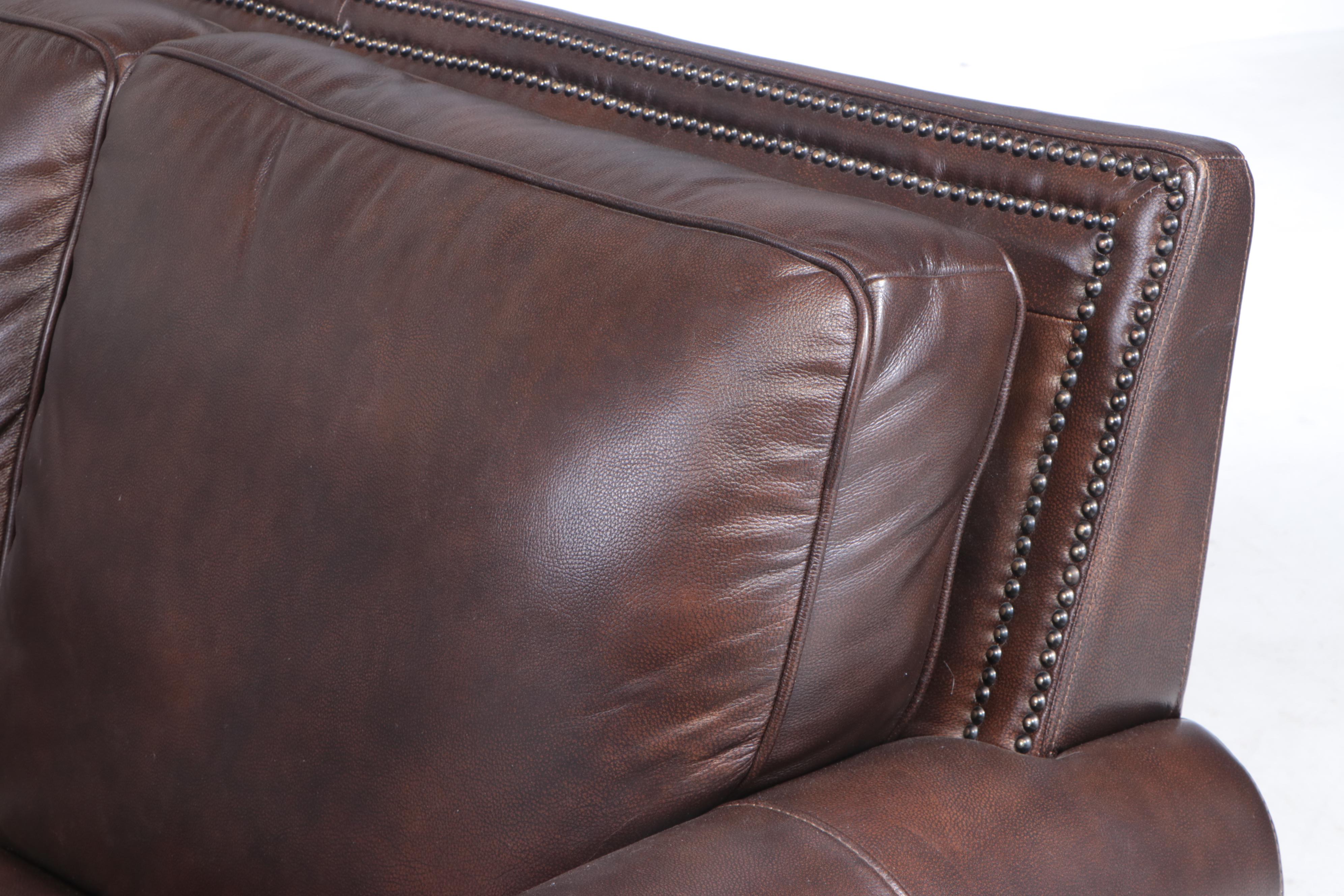 Superb Creations Leather Sectional Sofa with Ottoman
