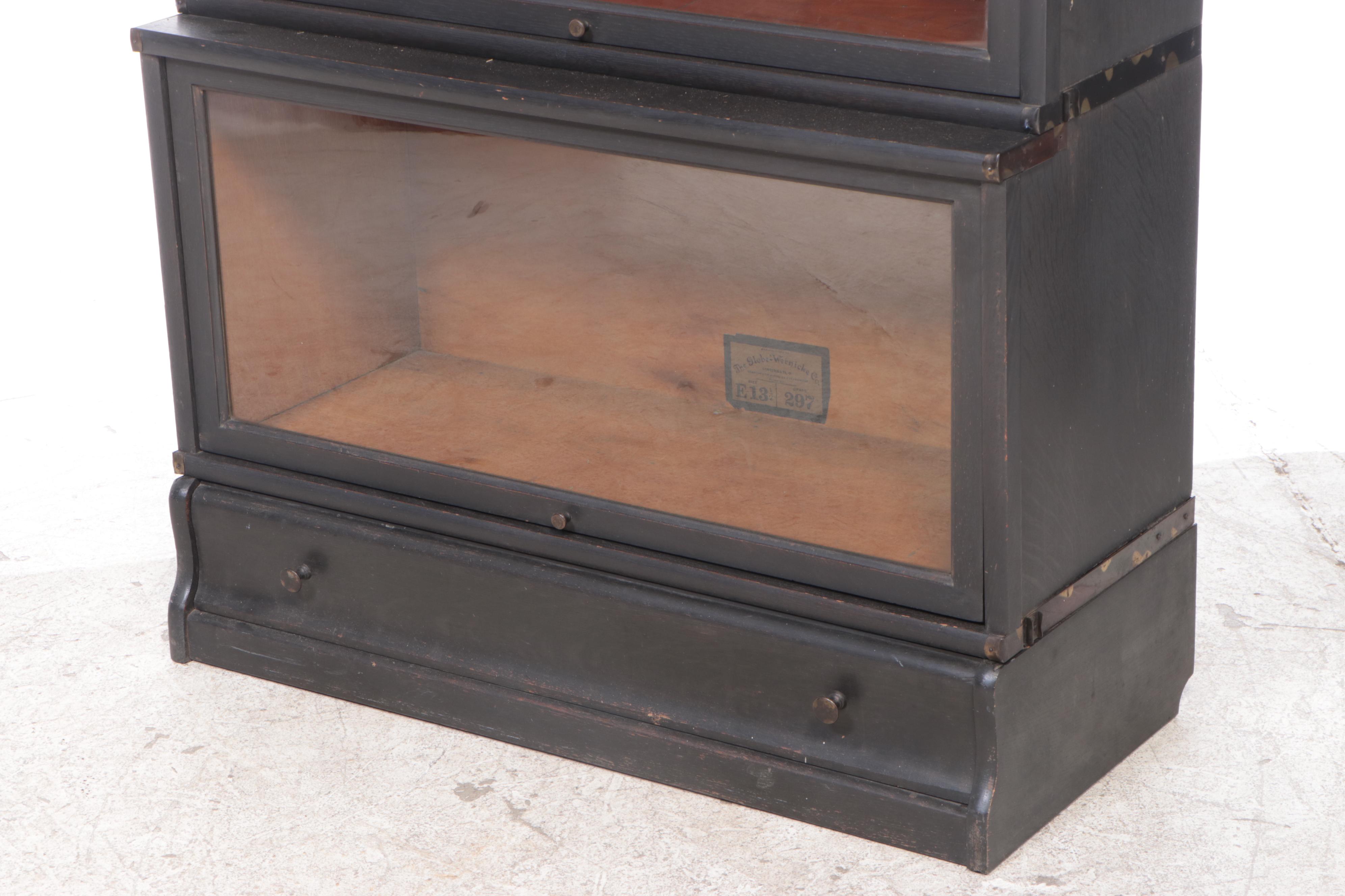 The Globe-Wernicke Co. Ebonized Oak Four-Stack Barrister's Bookcase with Drawer
