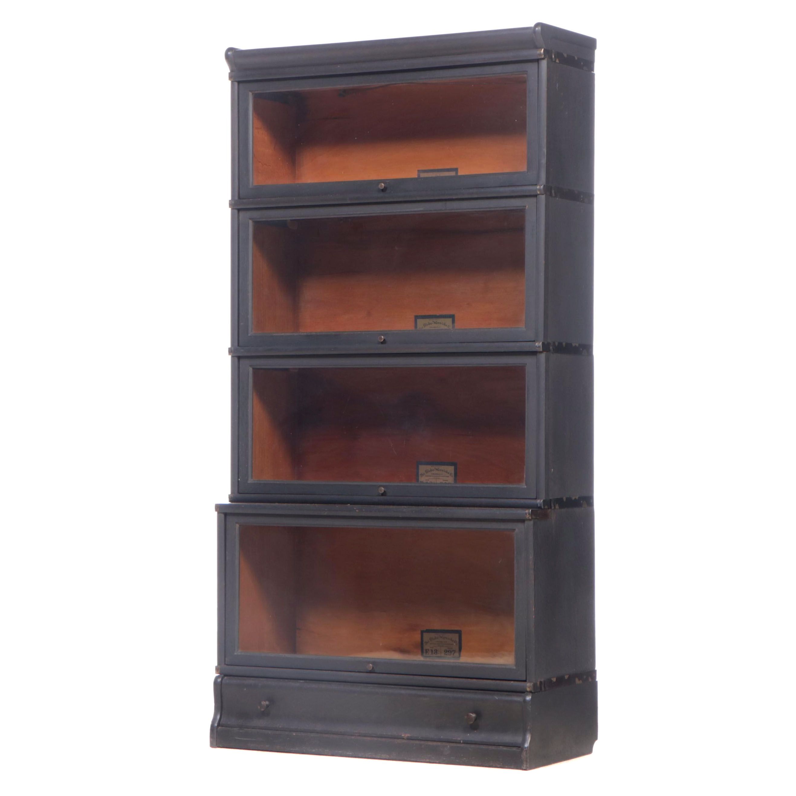 The Globe-Wernicke Co. Ebonized Oak Four-Stack Barrister's Bookcase with Drawer