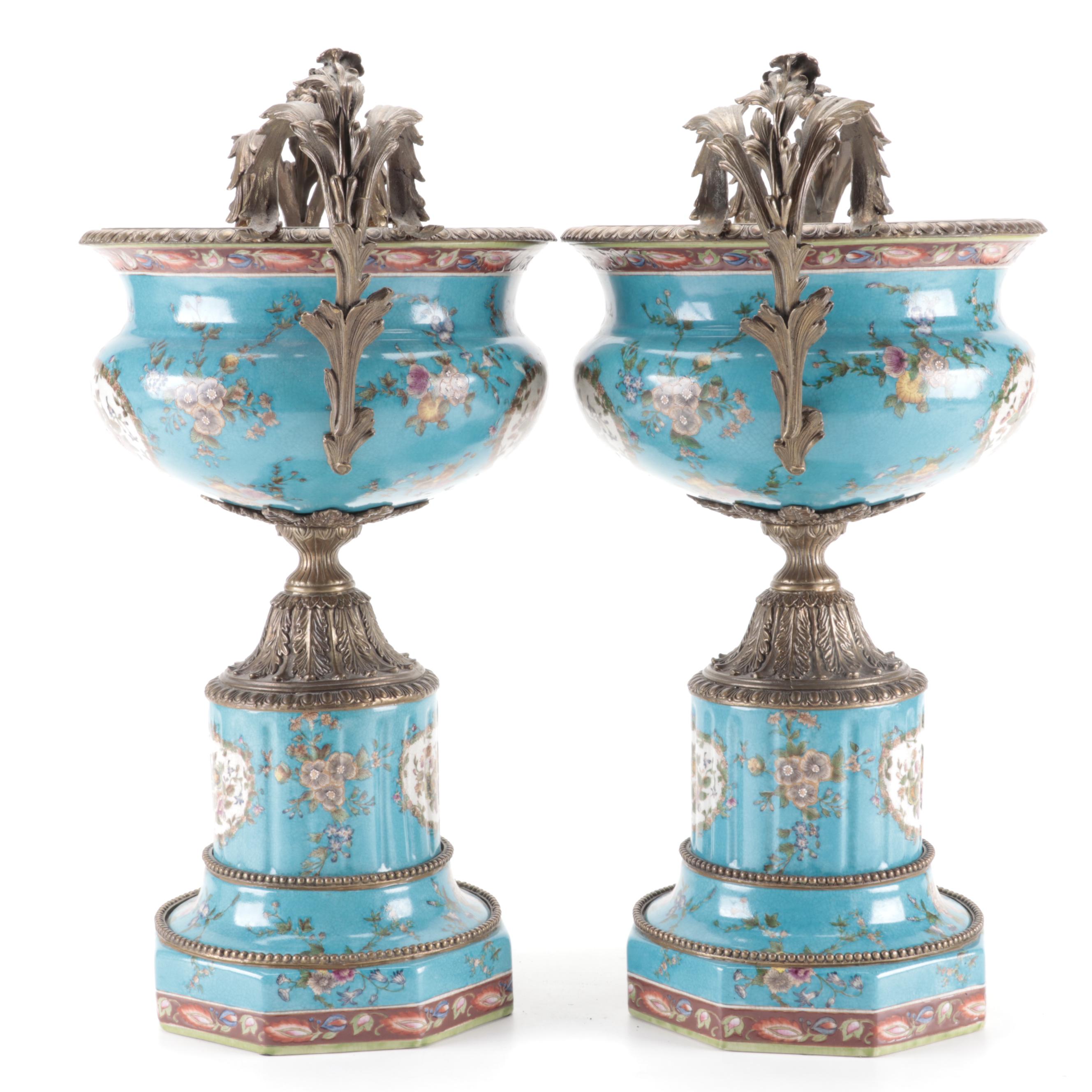 Pair of Wong Lee Sèvres Style Bleu Céleste Ormolu Mounted Porcelain Urns