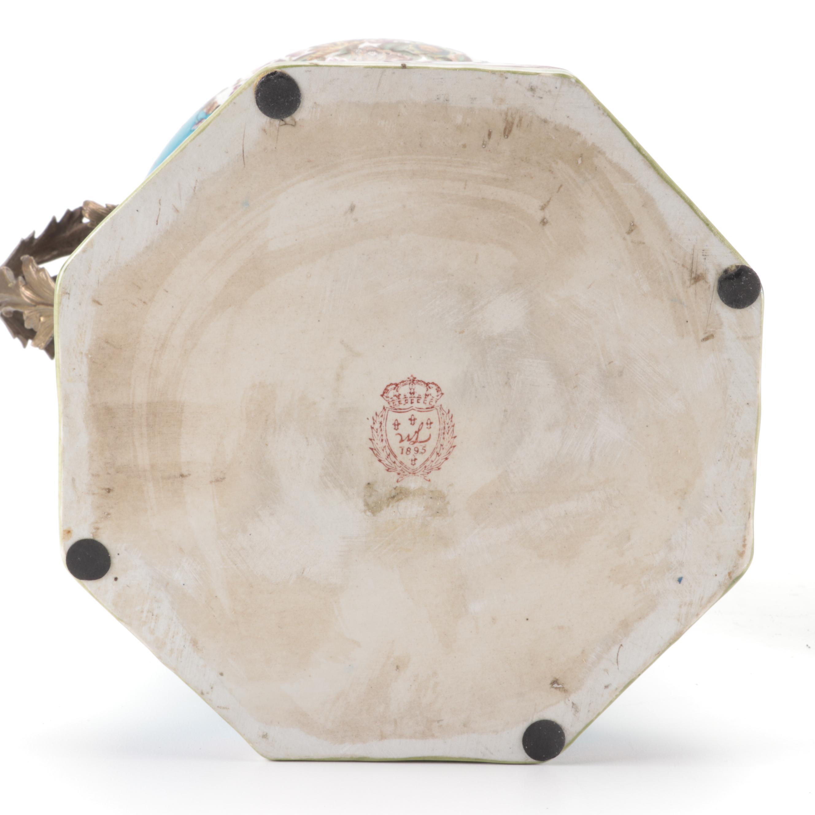 Pair of Wong Lee Sèvres Style Bleu Céleste Ormolu Mounted Porcelain Urns