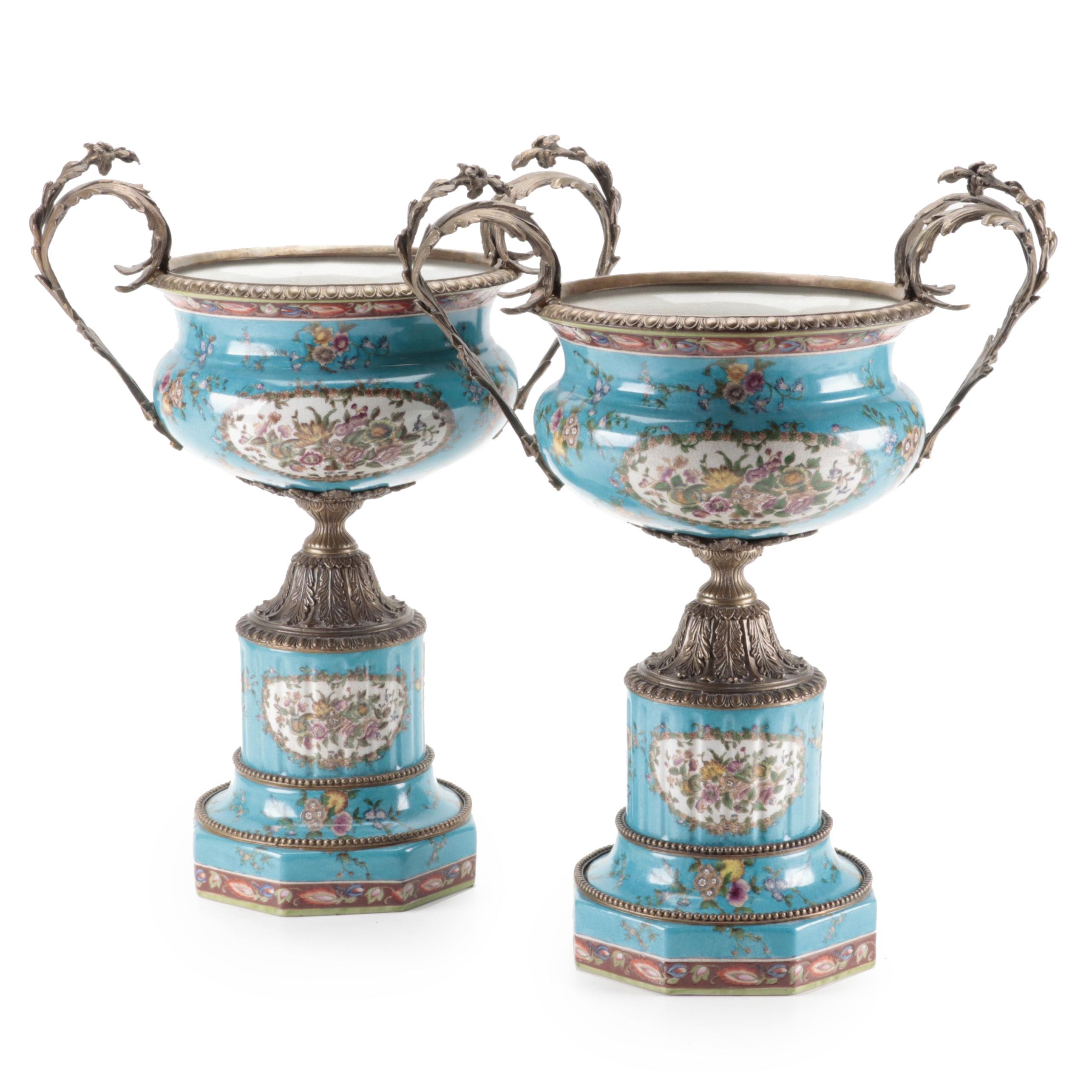Pair of Wong Lee Sèvres Style Bleu Céleste Ormolu Mounted Porcelain Urns