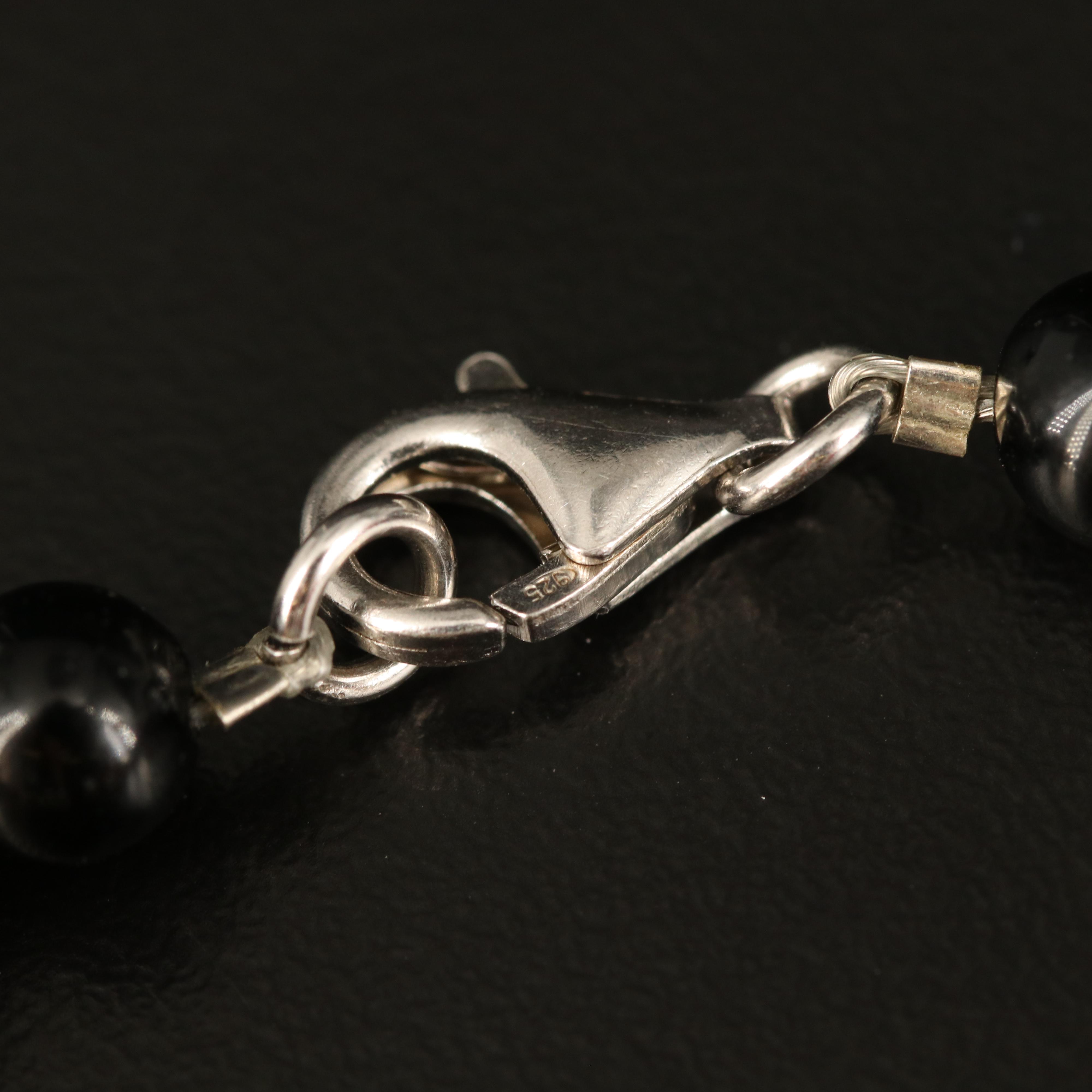 Pearl, Coral and Carved Serpentine Necklaces