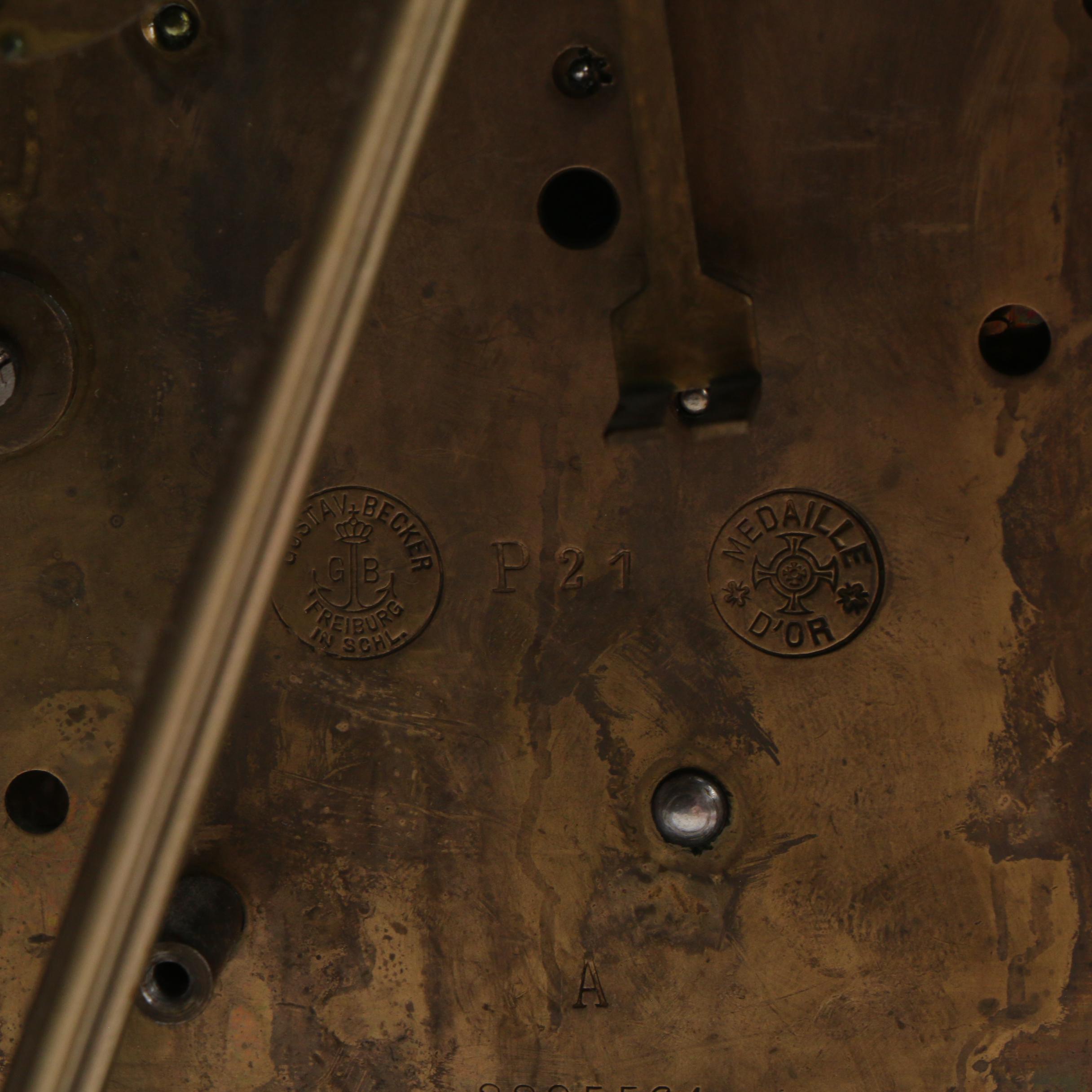 Kuehl and Gustav Becker Mahogany Mantel Clock with Brass Face, Early 20th C.