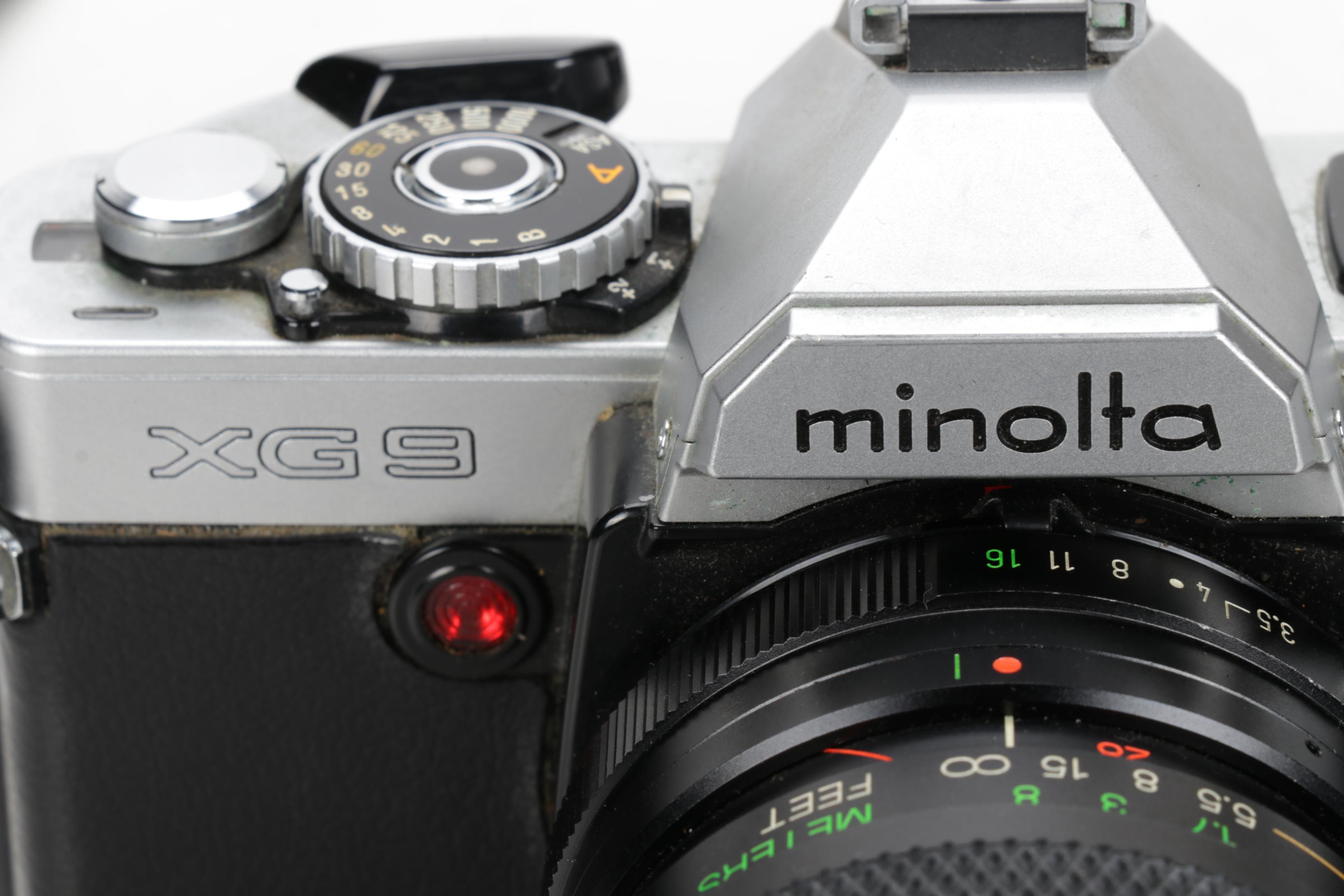 Minolta Maxxum 400si, XG9 and Nikon Point-and-Shoot Cameras with Accessories