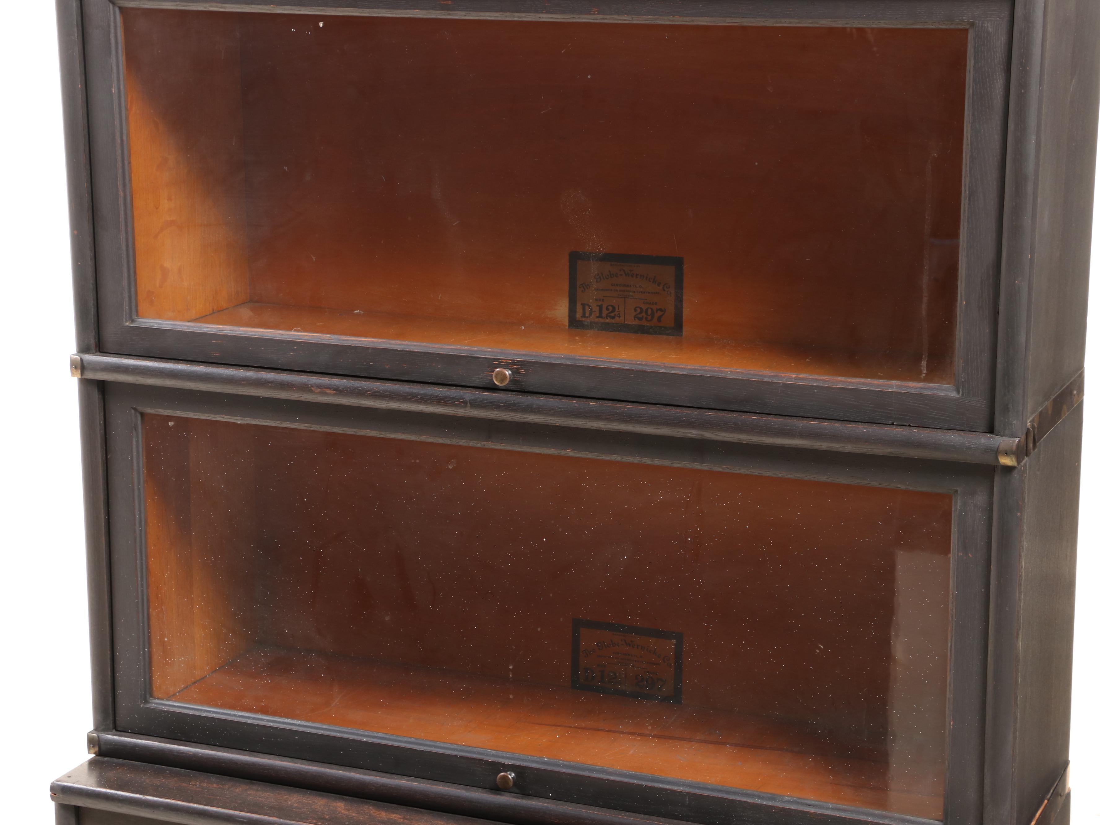The Globe-Wernicke Co. Ebonized Oak Four-Stack Barrister's Bookcase with Drawer