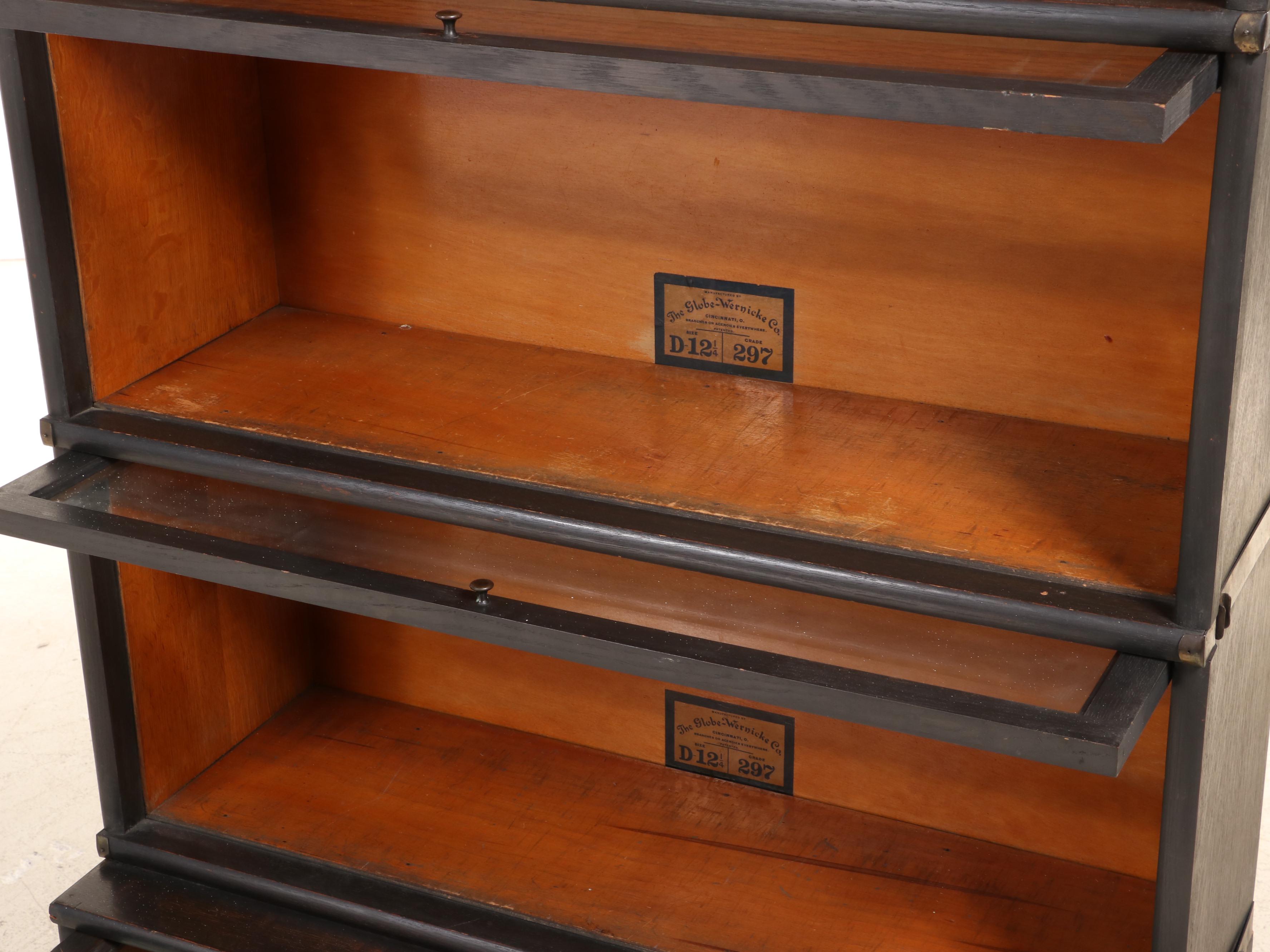 The Globe-Wernicke Co. Ebonized Oak Four-Stack Barrister's Bookcase with Drawer