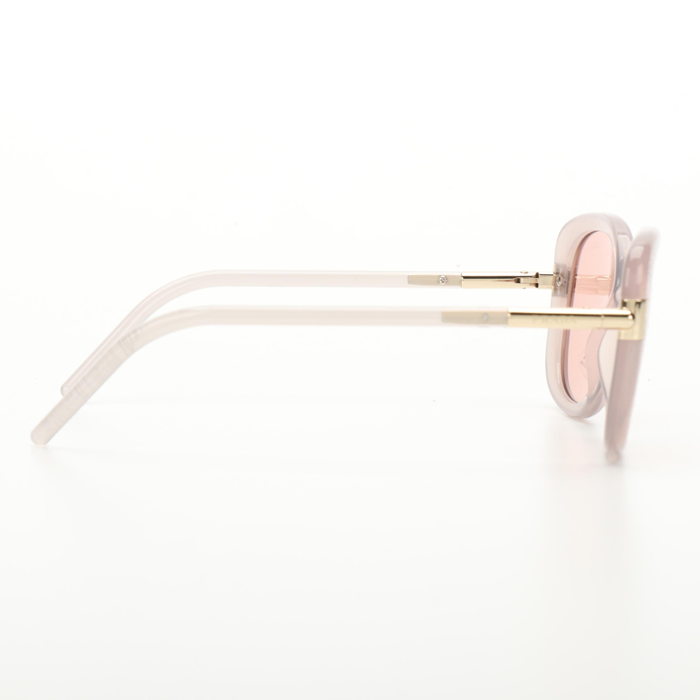 Prada SPR04W Translucent Pink Opal Frame Pink Lens Sunglasses with Case